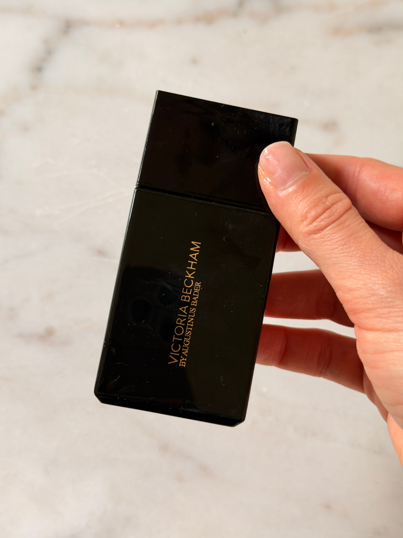Grace Day holding the Victoria Beckham Beauty foundation