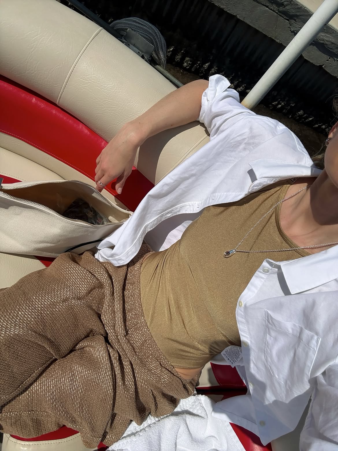 Anouk Yve in a khaki tank.