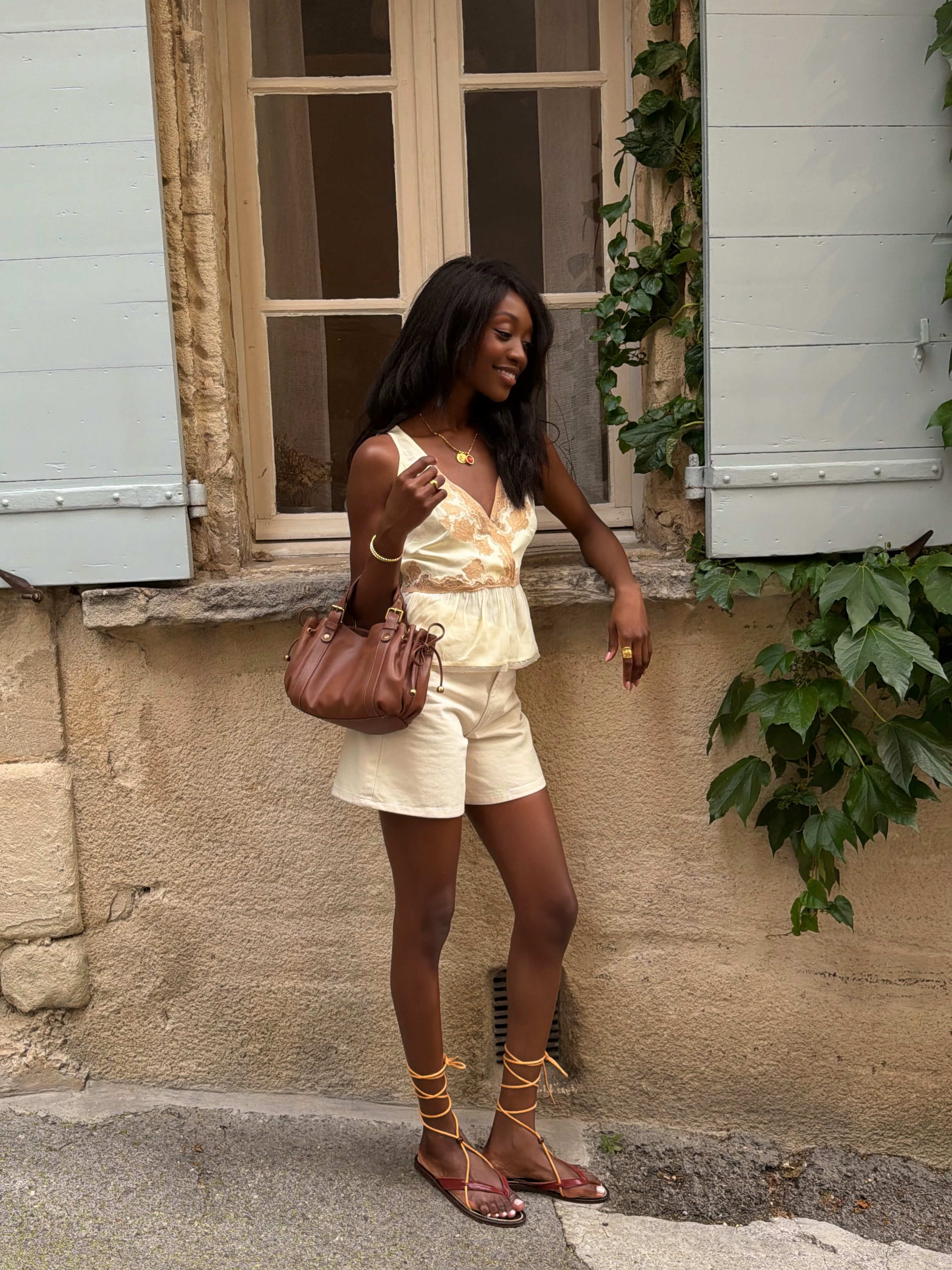 Emmanuelle in butter yellow and brown summer outfit