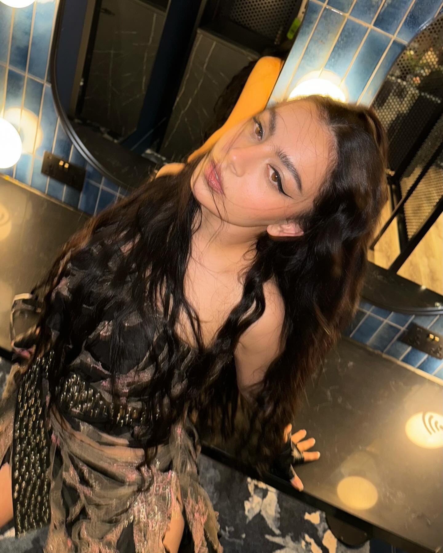 Charli XCX wearing makeup by Yasmin Istanbouli.