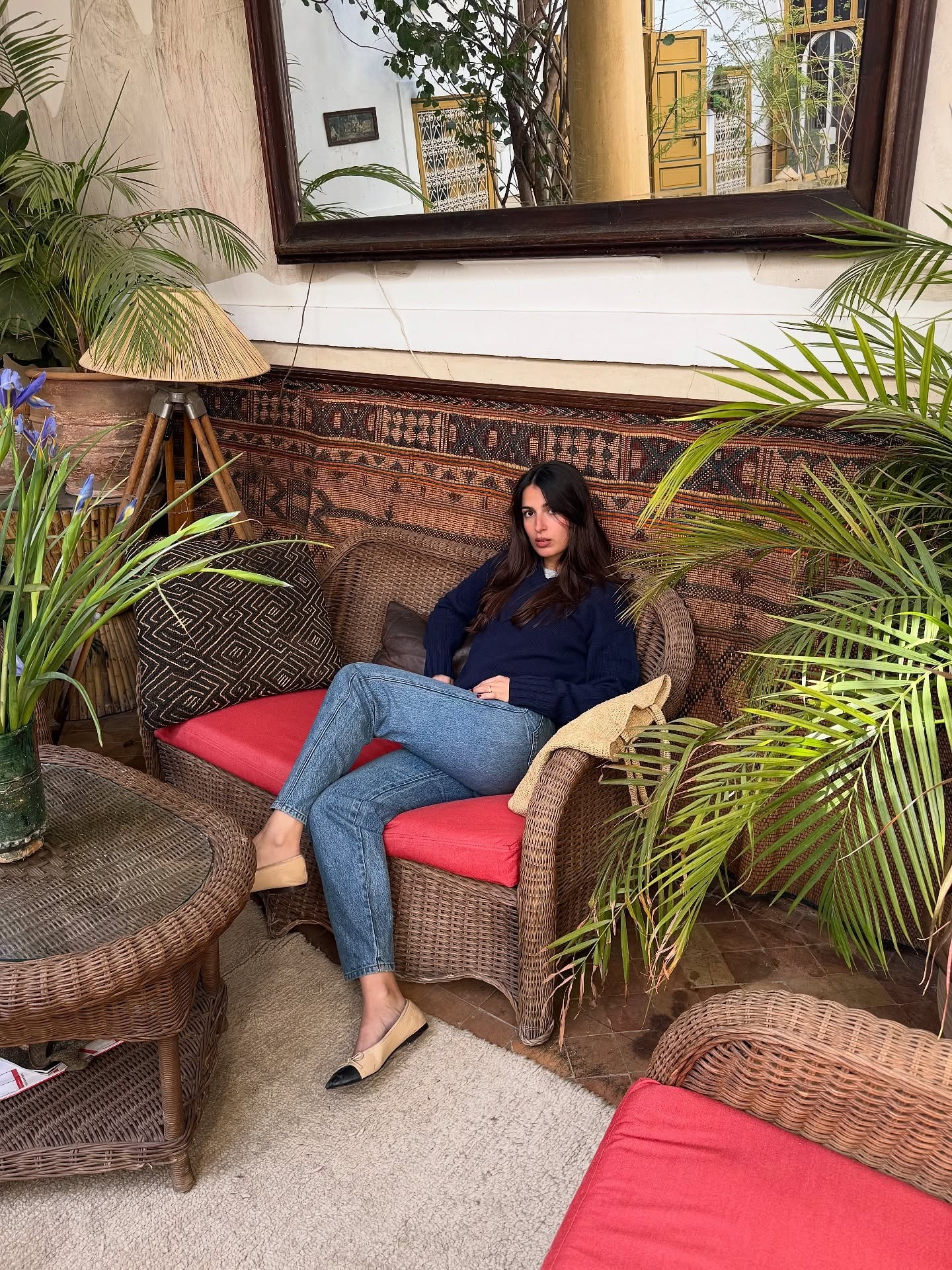 Influencer @tamaramory wears cropped jeans with ballet flats and a navy jumper.
