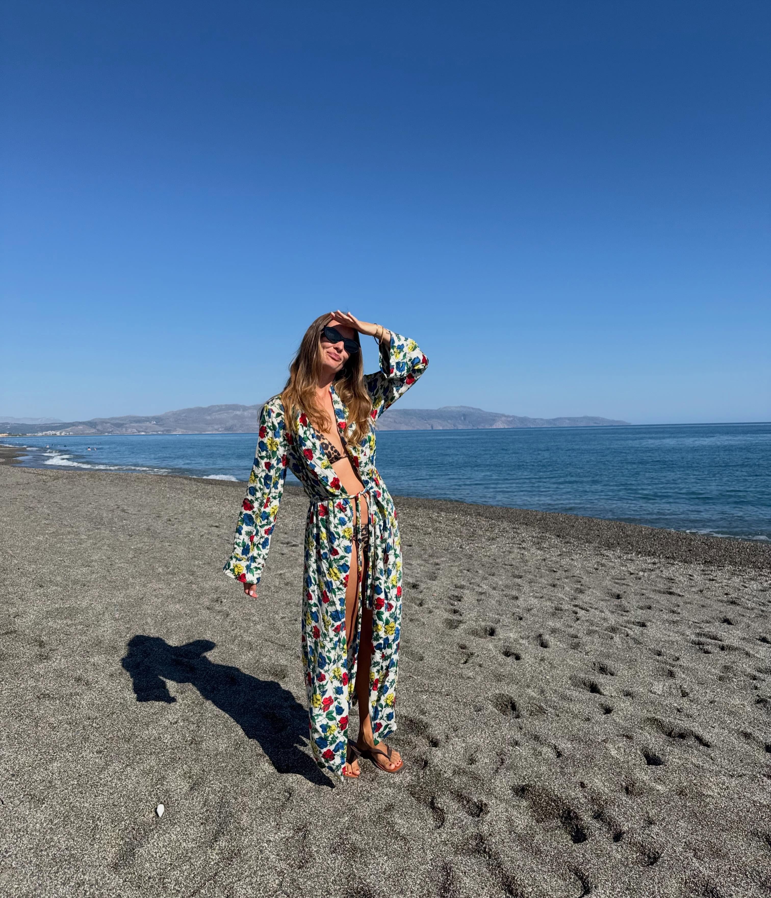 An image of a woman wearing front tie top bikini outfit summer 2026