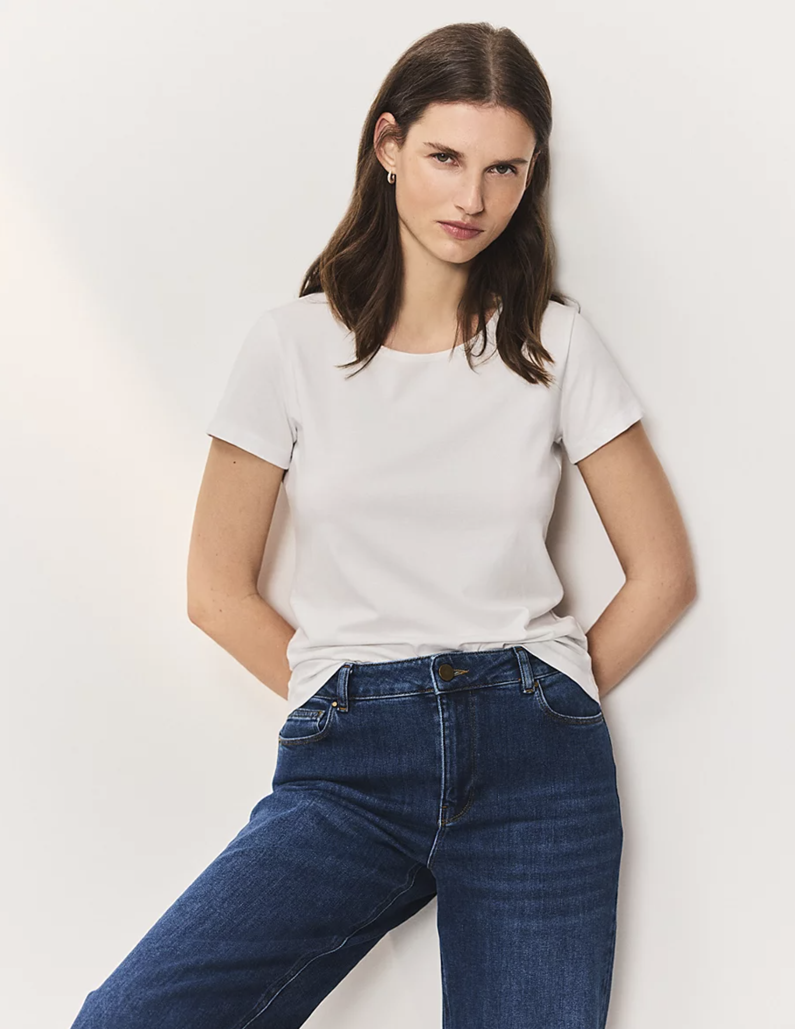 white company white t shirt and jeans model shot