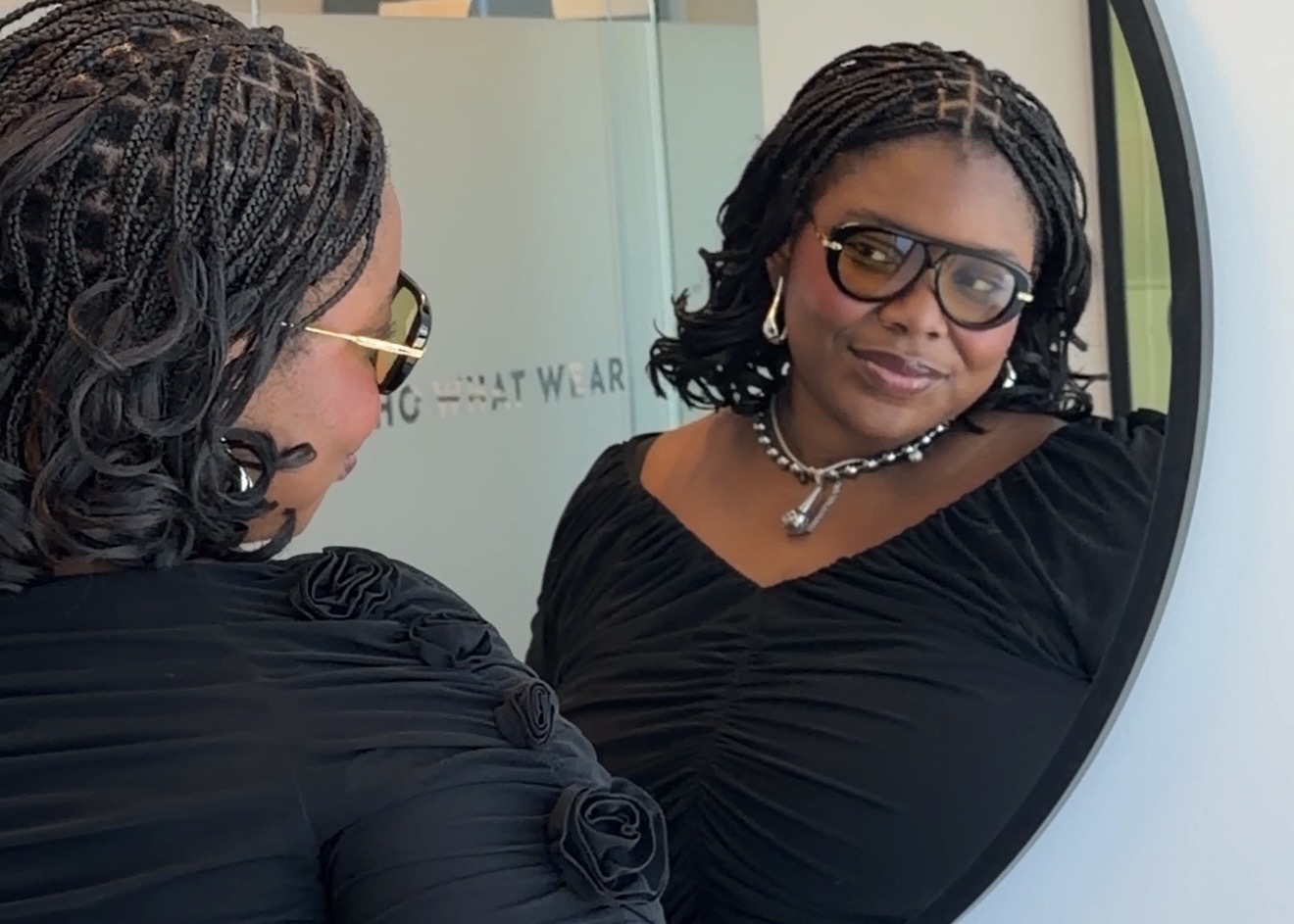 Chichi Offor wearing Alo's new yellow-lens Aviator sunglasses.
