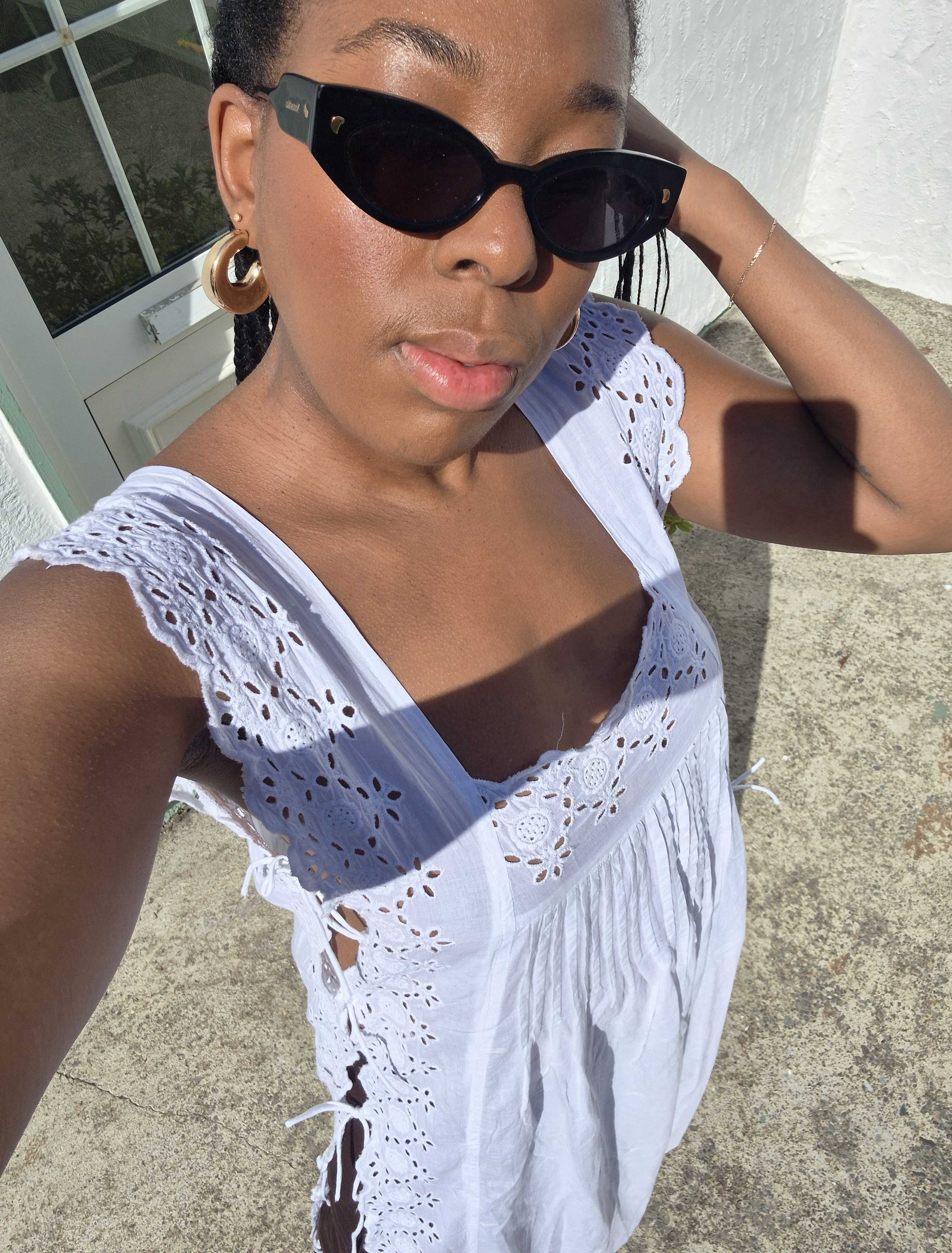 An image of @remyfarrell wearing the bib top trend.