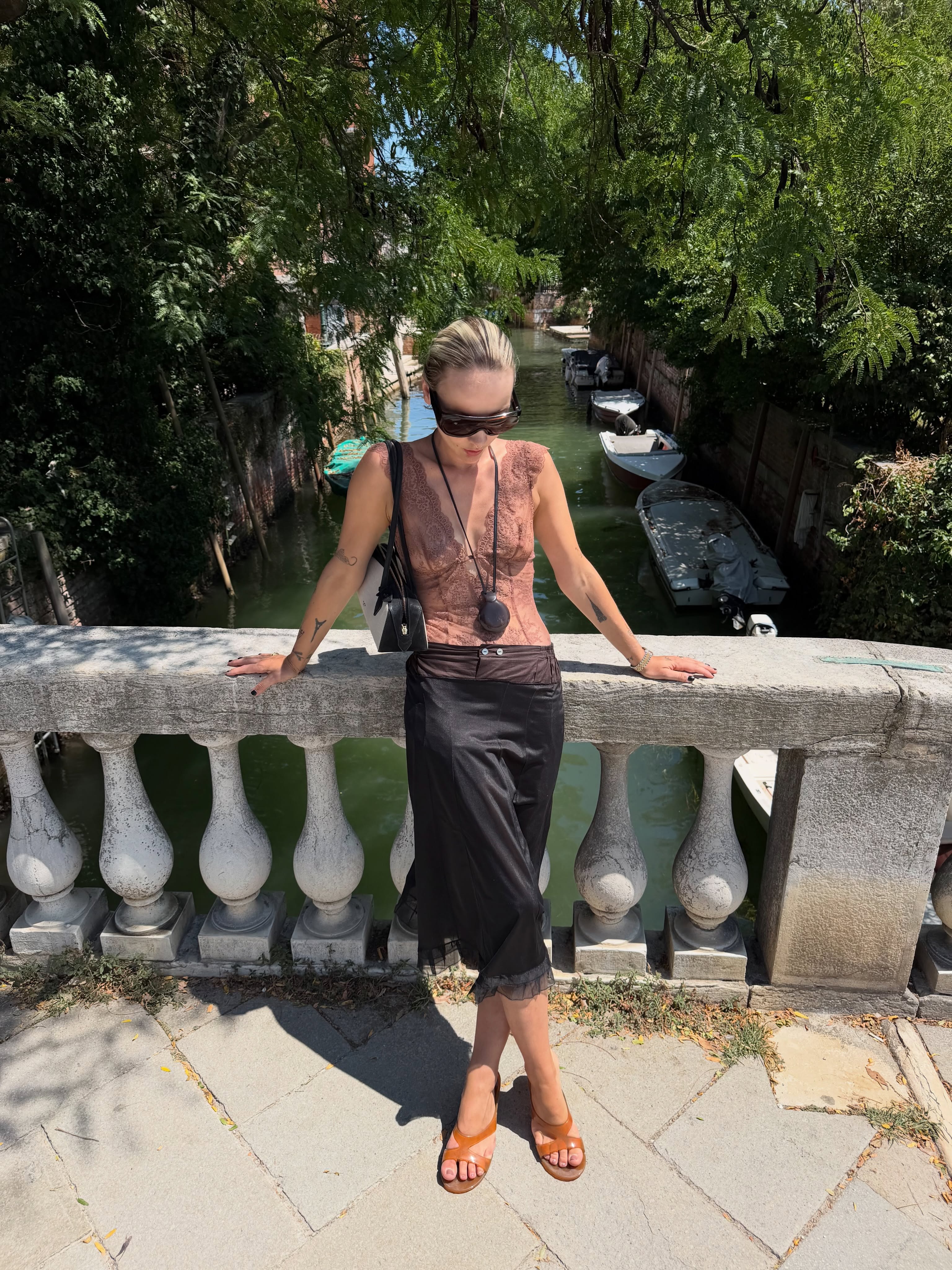 Lucie wearing Jimmy Choo Jelly Sandals