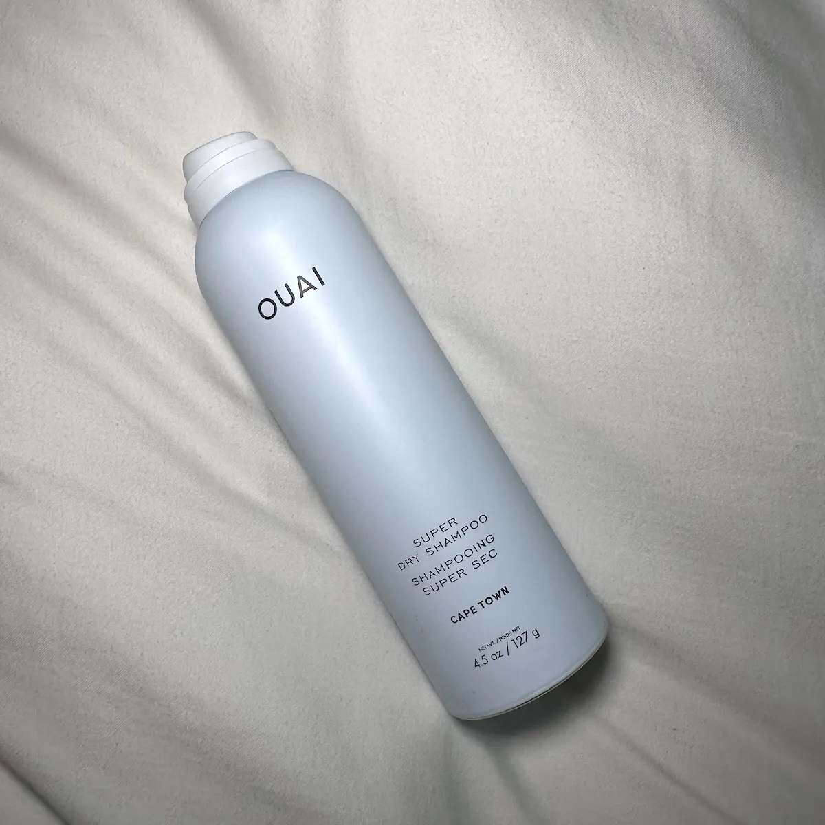 A can of Ouai dry shampoo.
