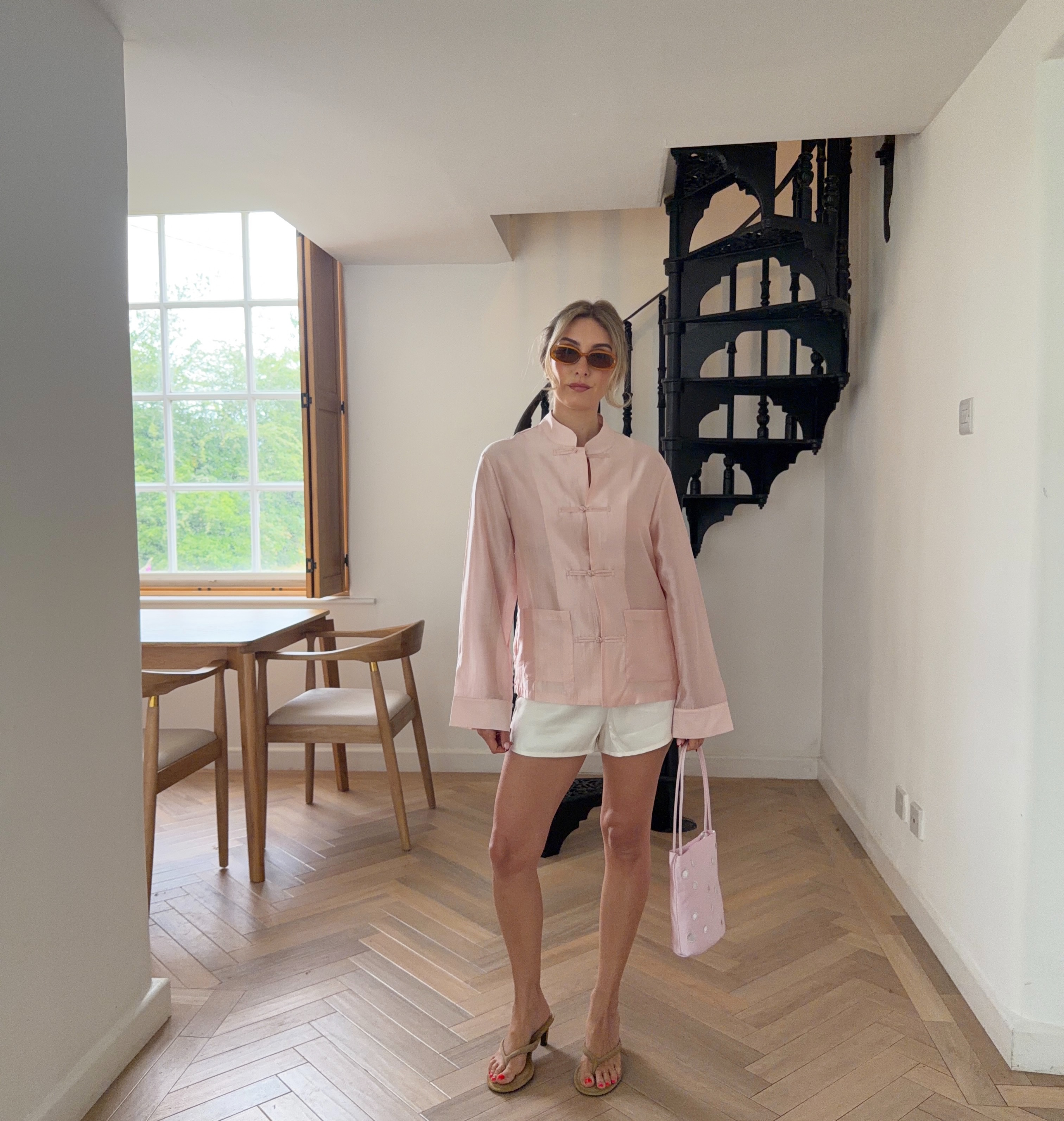 A woman wearing light-latte shoes in summer 2026.