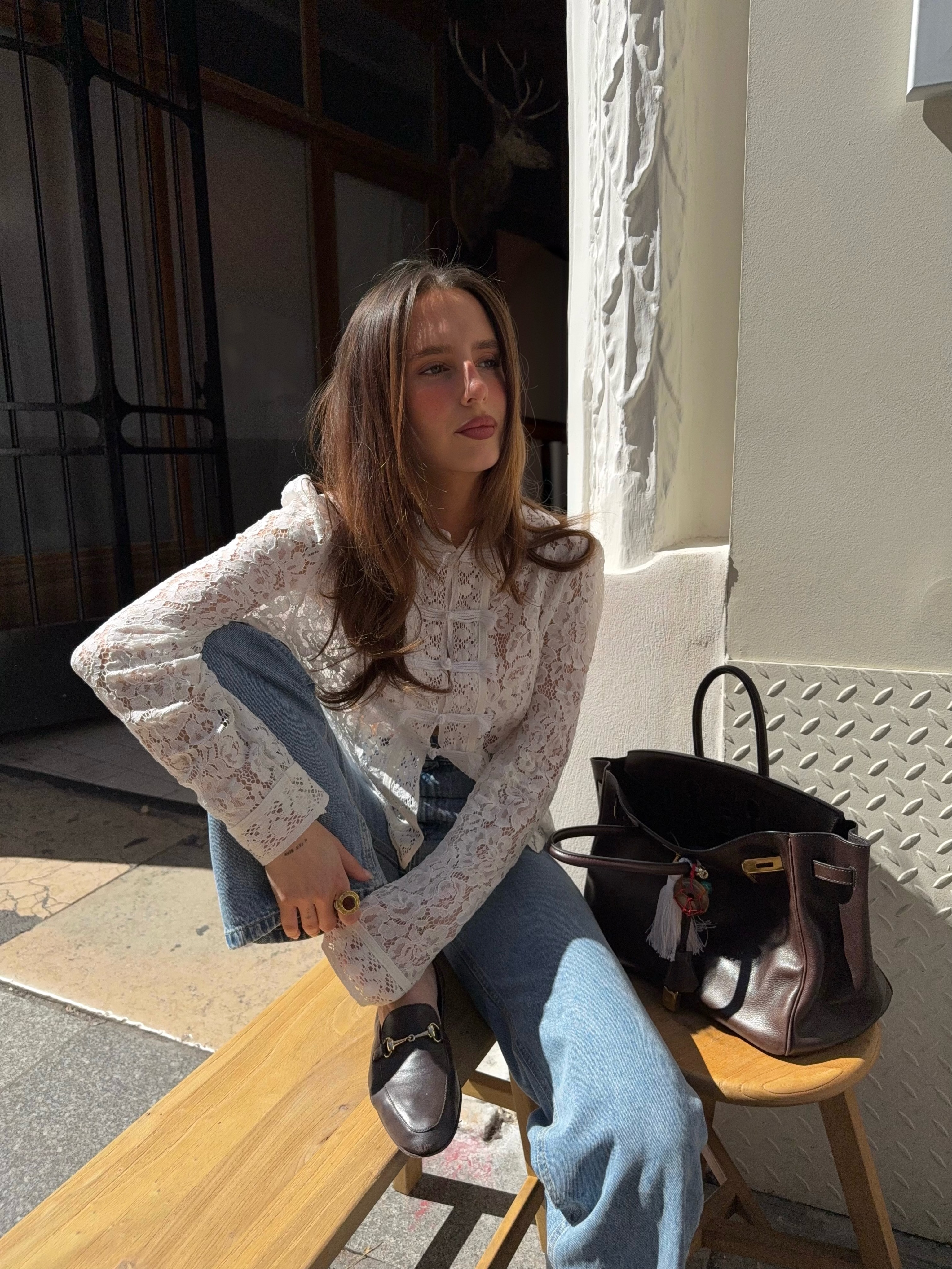 Clem in lace blouse and blue jeans