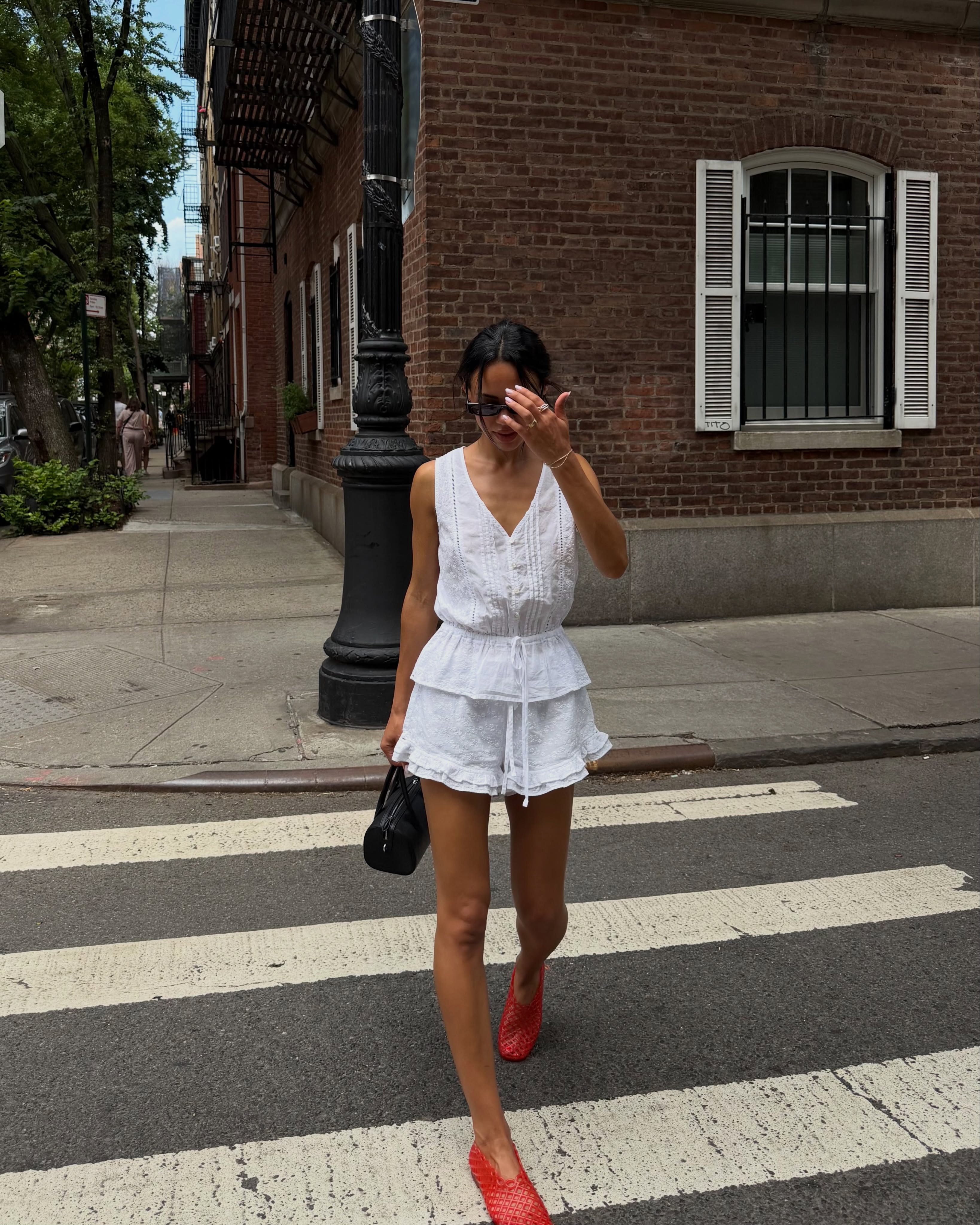 An image of a woman wearing best white linen fashion item for summer 2026