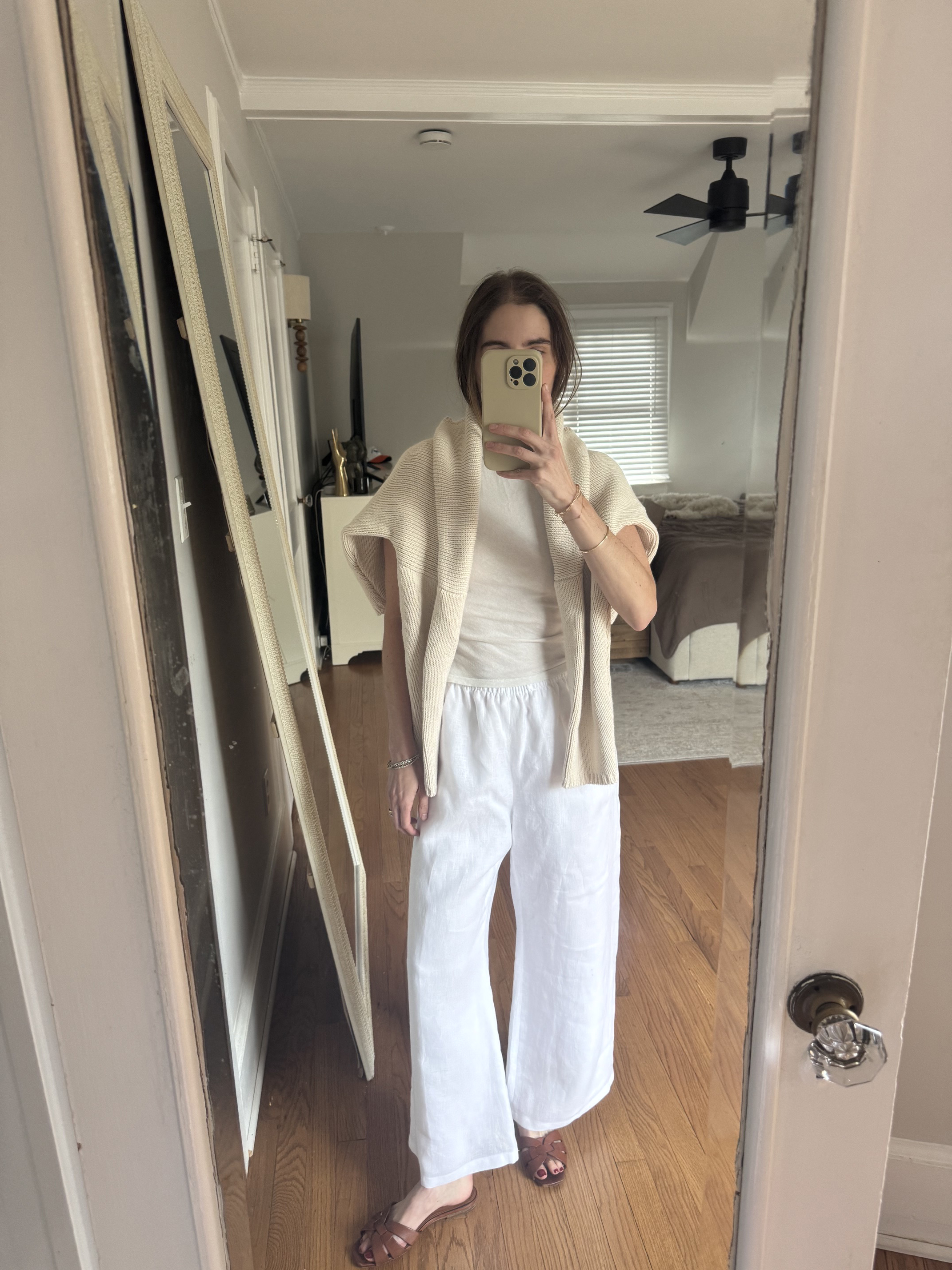 Tessa Faye O'Connell wearing white linen pants