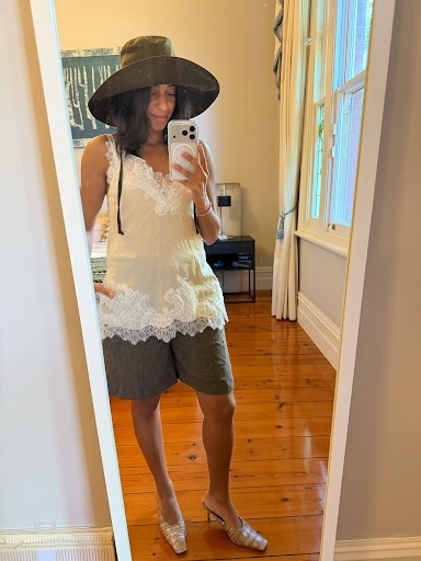Cathy Karuga wearing canvas hat.