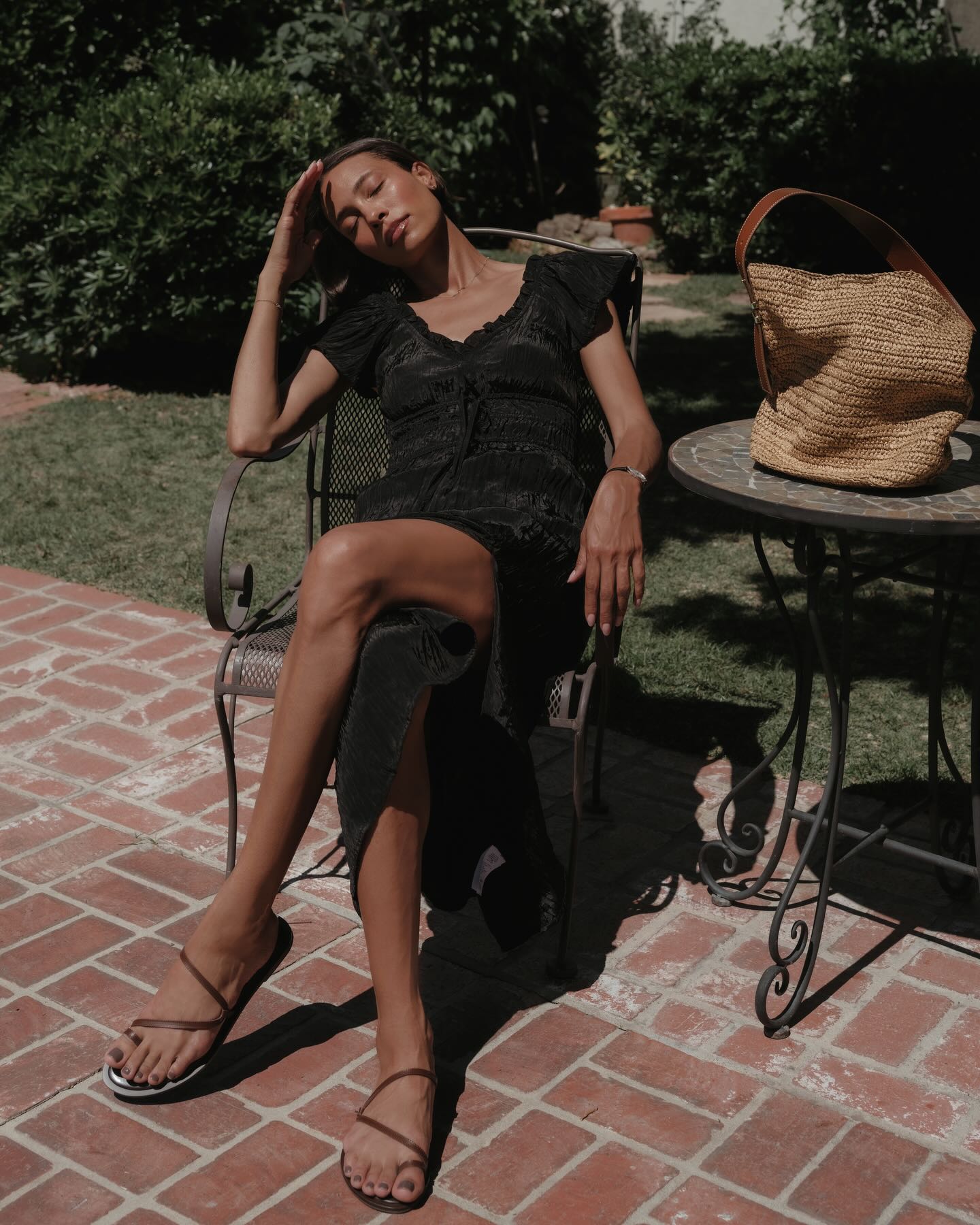 Tylynn Nguyen wears Cotton Midi Dress + Basket Bag
