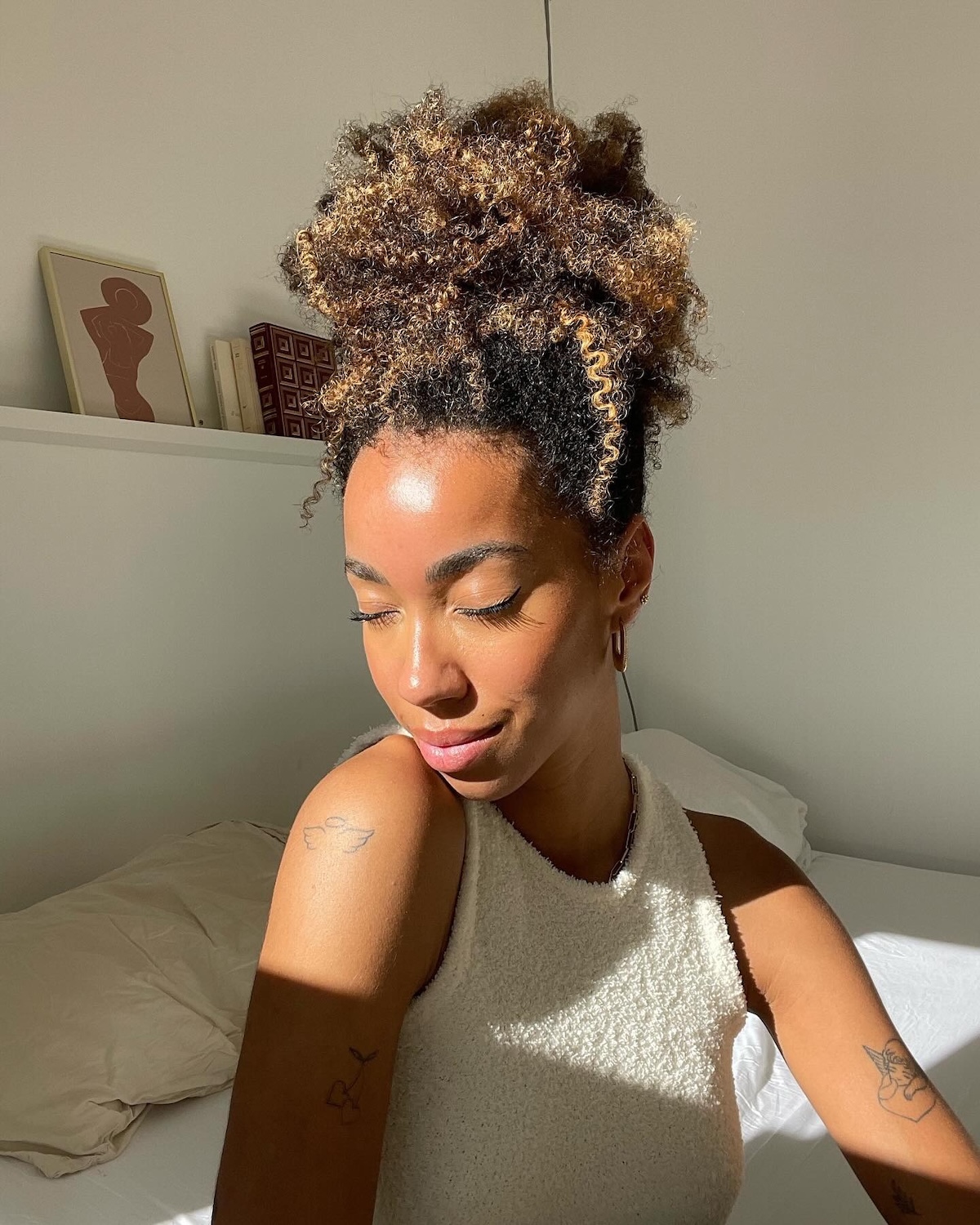 Teddy bear bronde on curly hair.