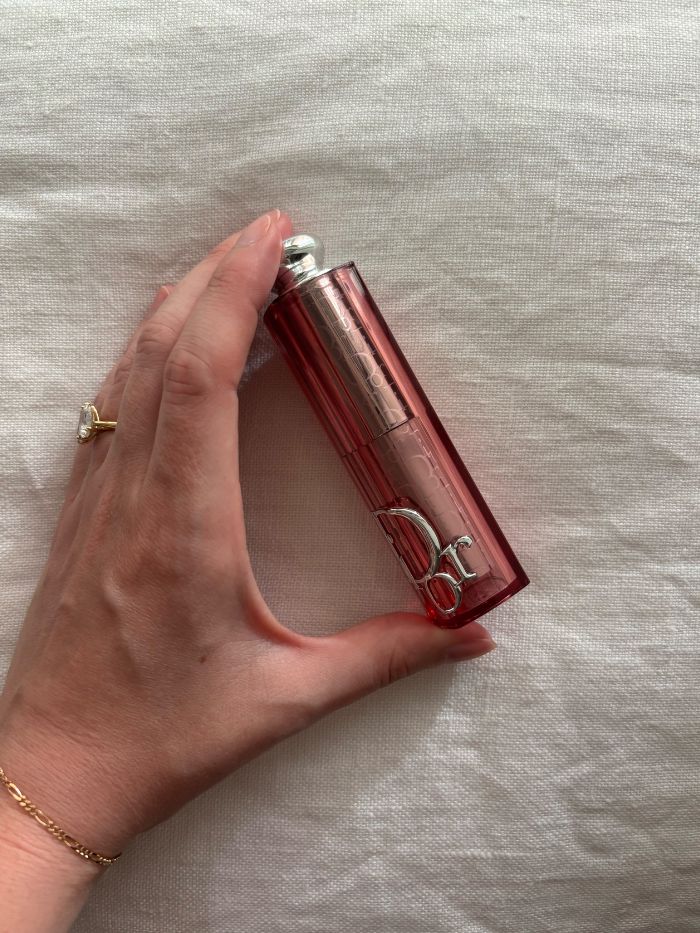 Deputy beauty editor Grace Lindsay holding the Dior Backstage Rosy Glow Stick