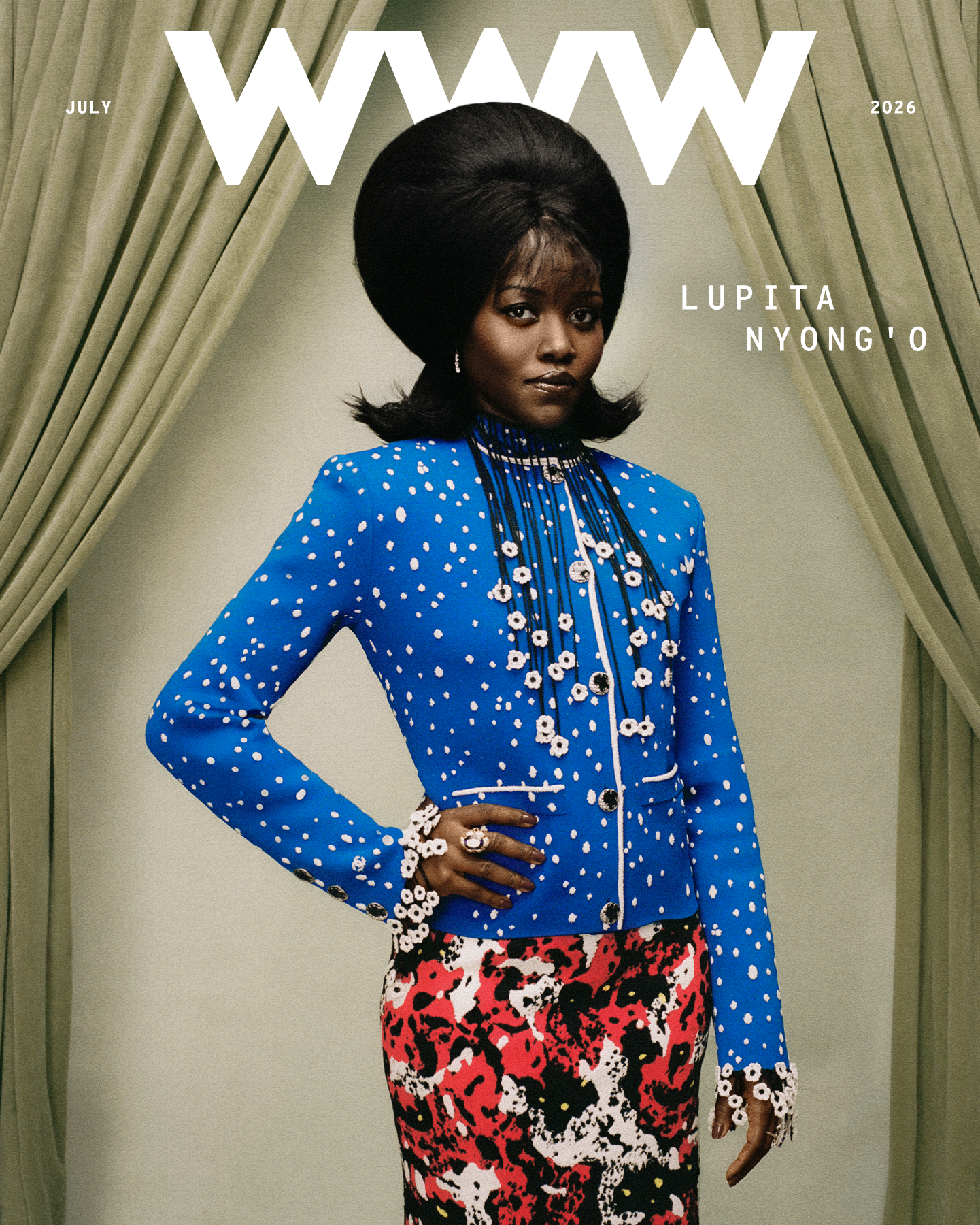 Cover image for Who What Wear's July cover story featuring Lupita Nyong'o wearing a Chanel blue and white jacket with red, black, and white printed skirt.