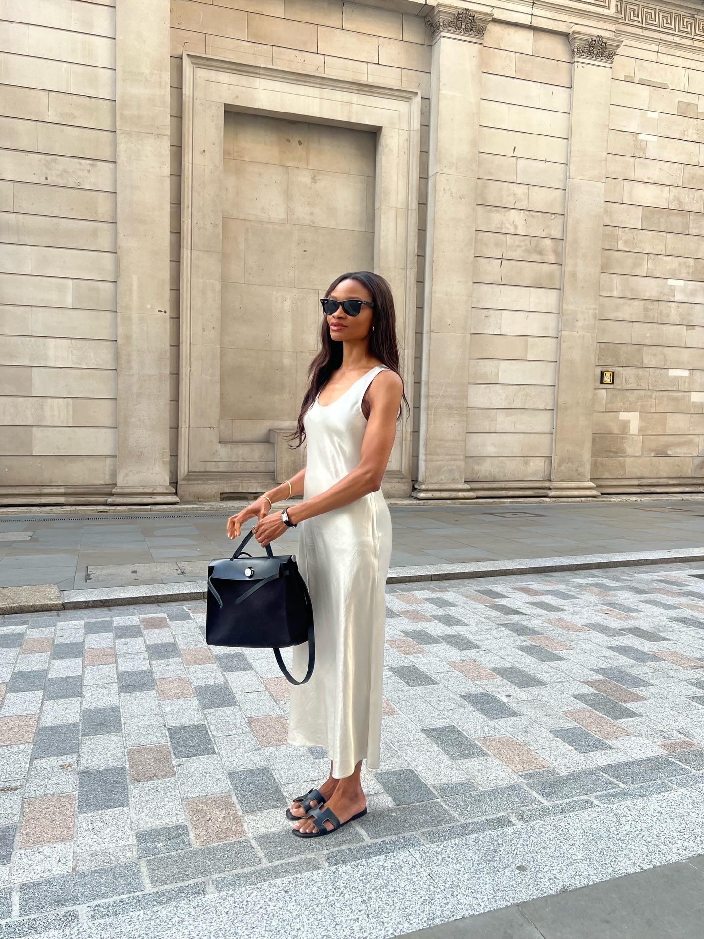 Lorna wears a Slip Dress and Flat Sandals