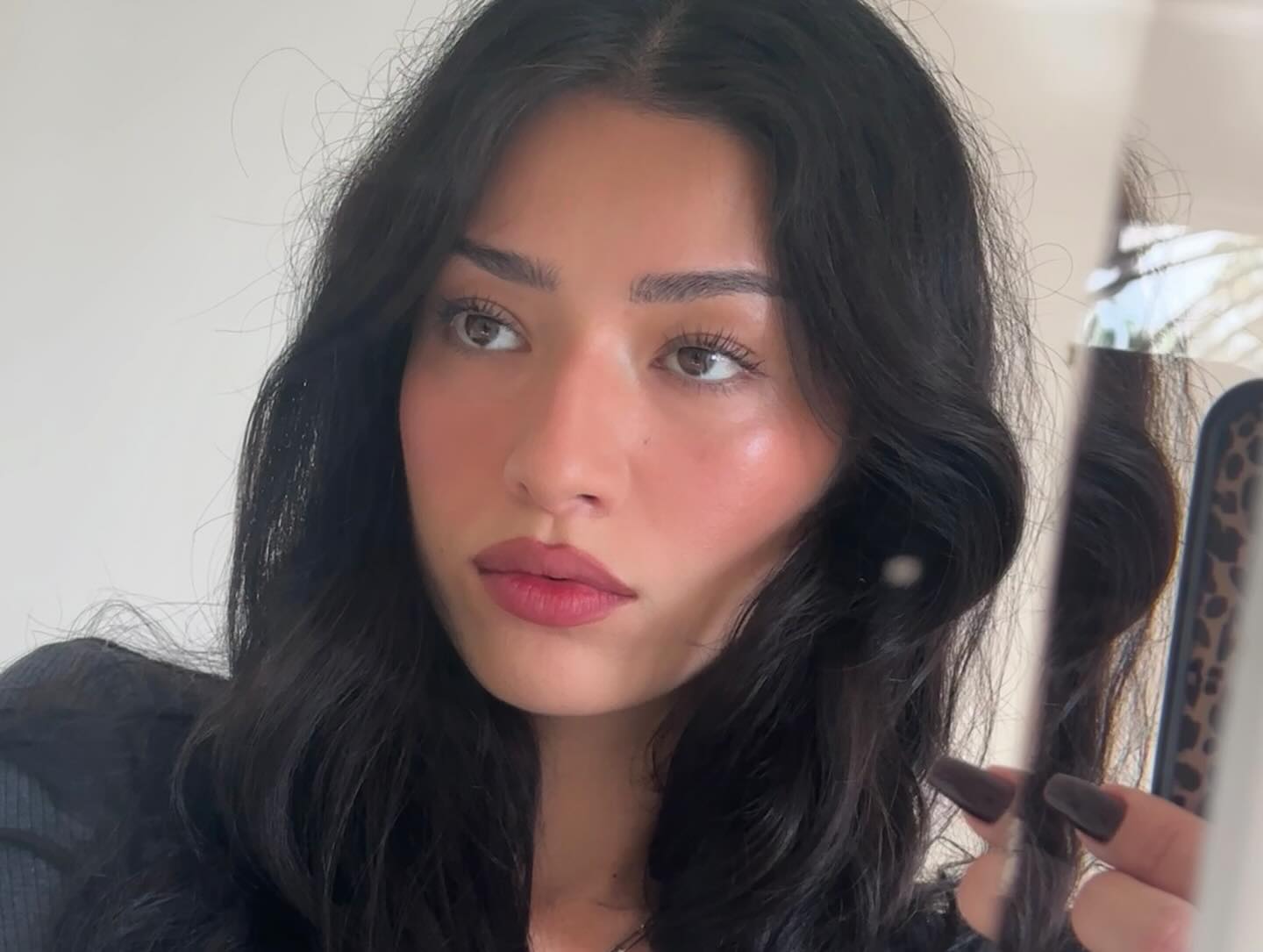 A mirror selfie of celebrity makeup artist Yasmin Istanbouli.