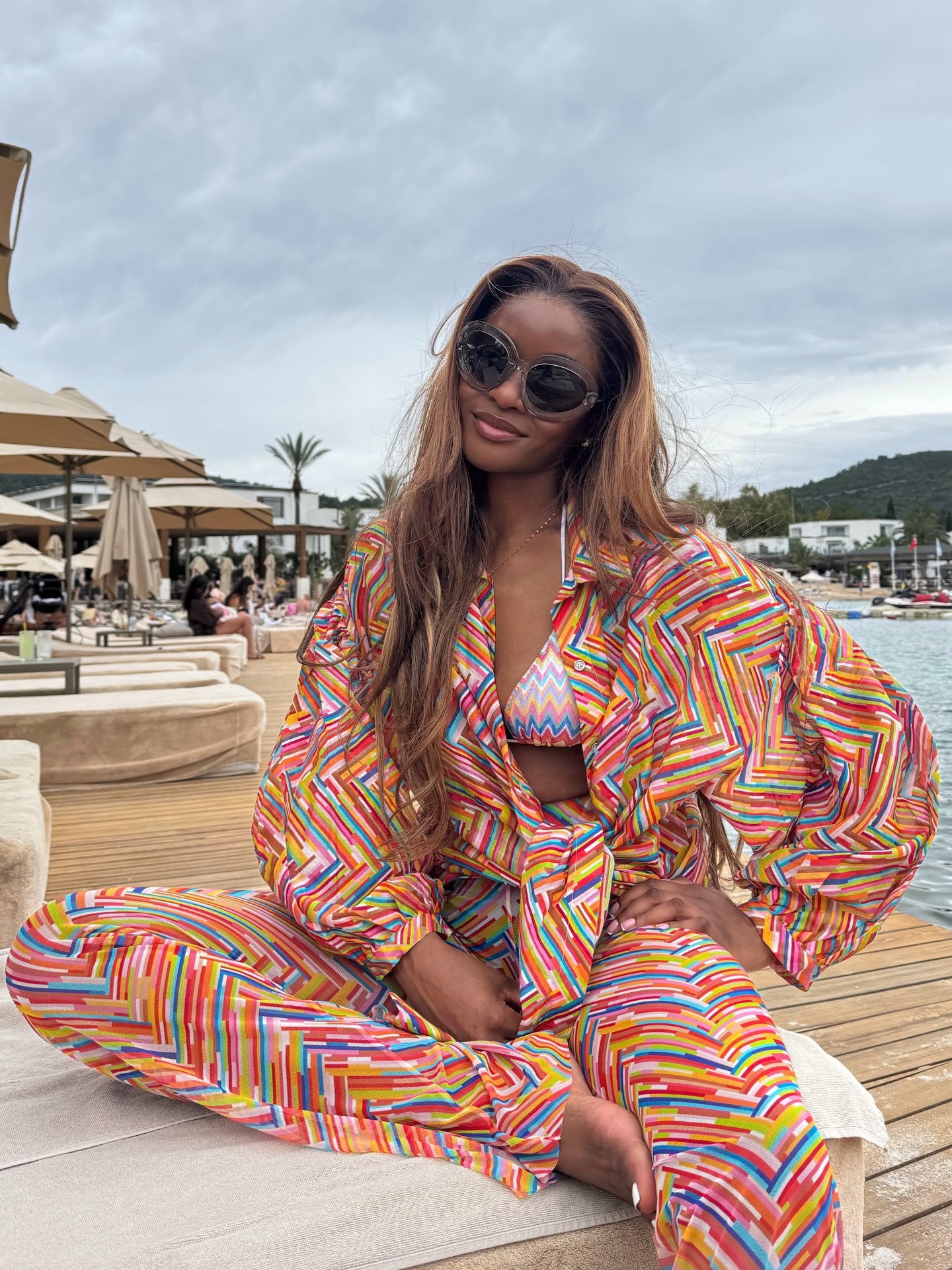 An image of a woman wearing front tie top bikini outfit summer 2026