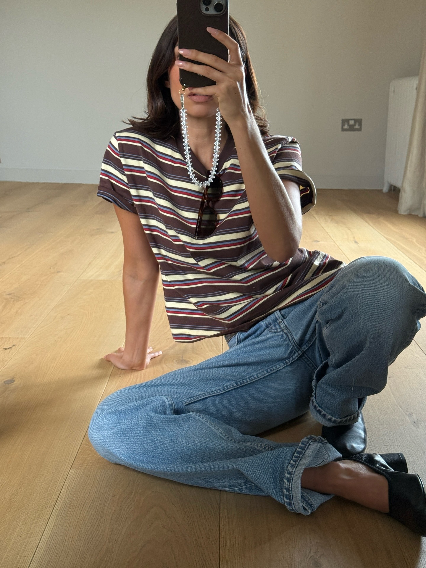 Influencer Marianne Smyth wearing a retro striped tee