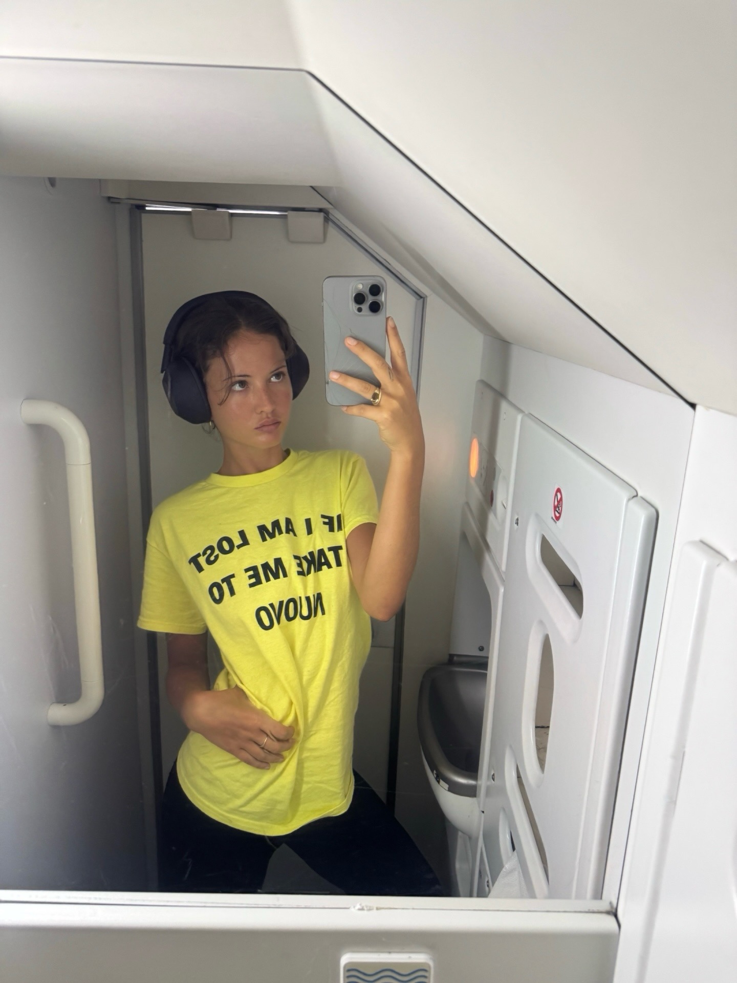 Image of @rubylyn wearing a graphic t-shirt. its bright yellow with black writing