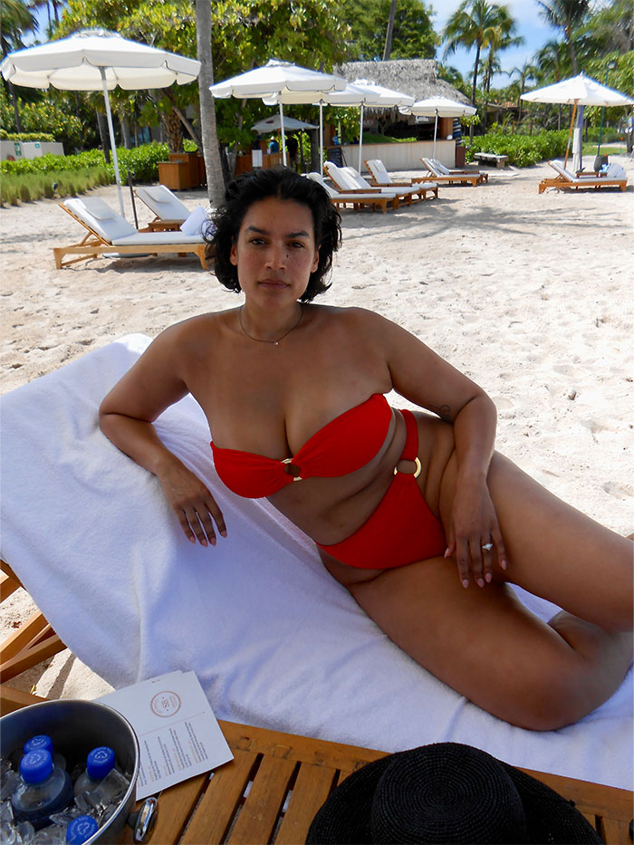 Jennifer Atilemile wearing a vacation outfit.