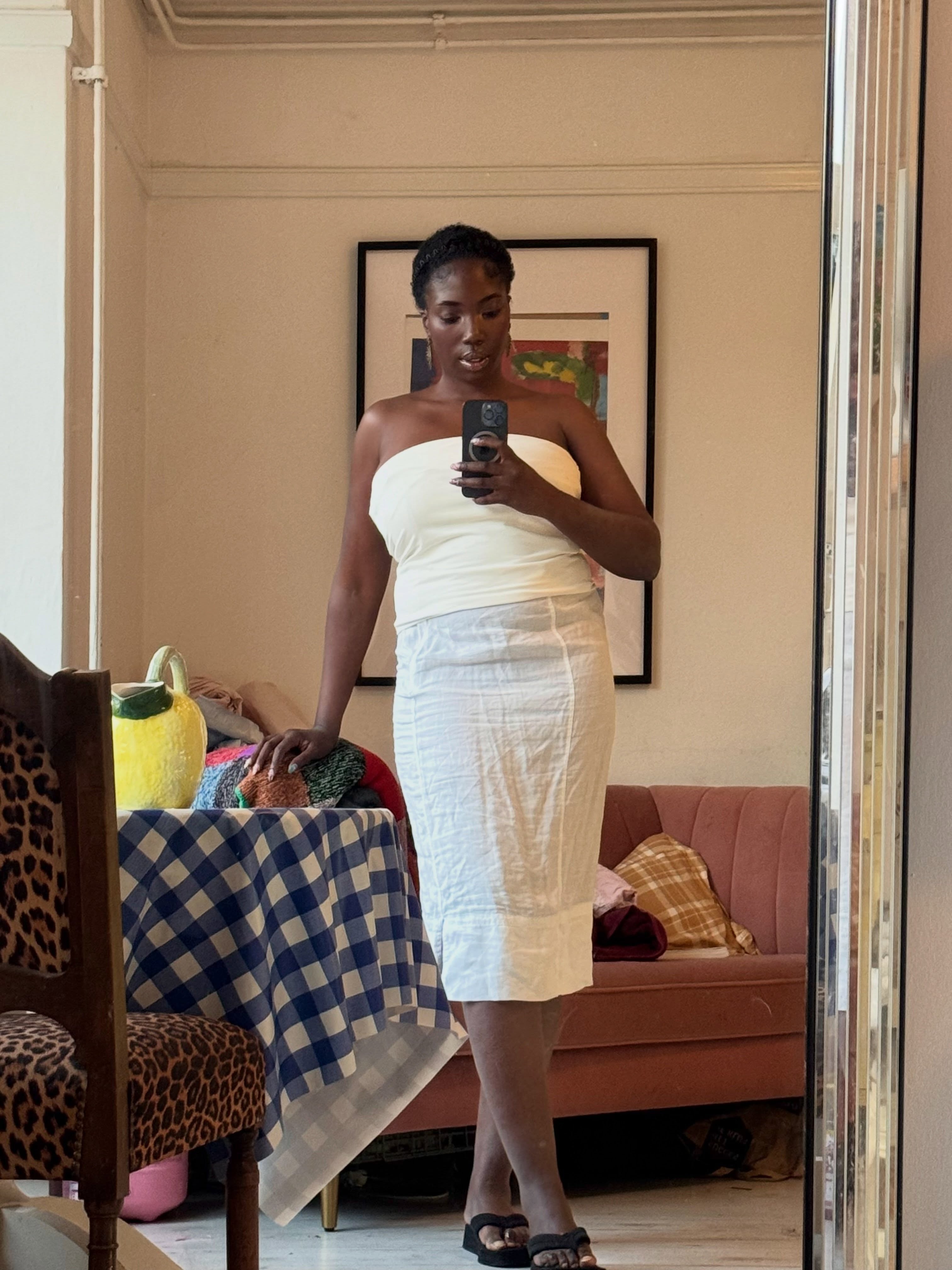 An image of a woman wearing best white linen fashion item for summer 2026