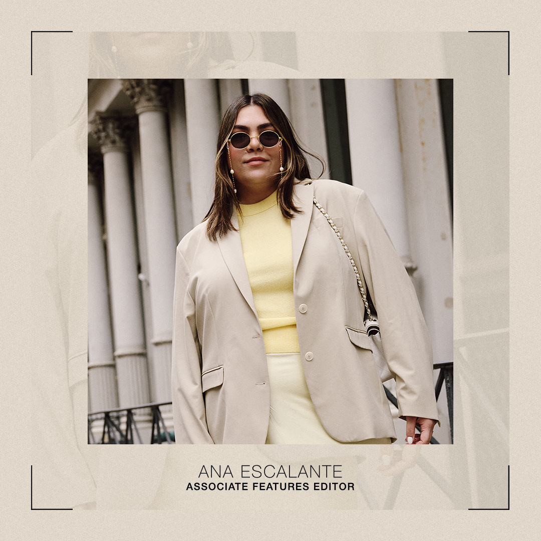 Ana wears a beige blazer and a yellow tee.