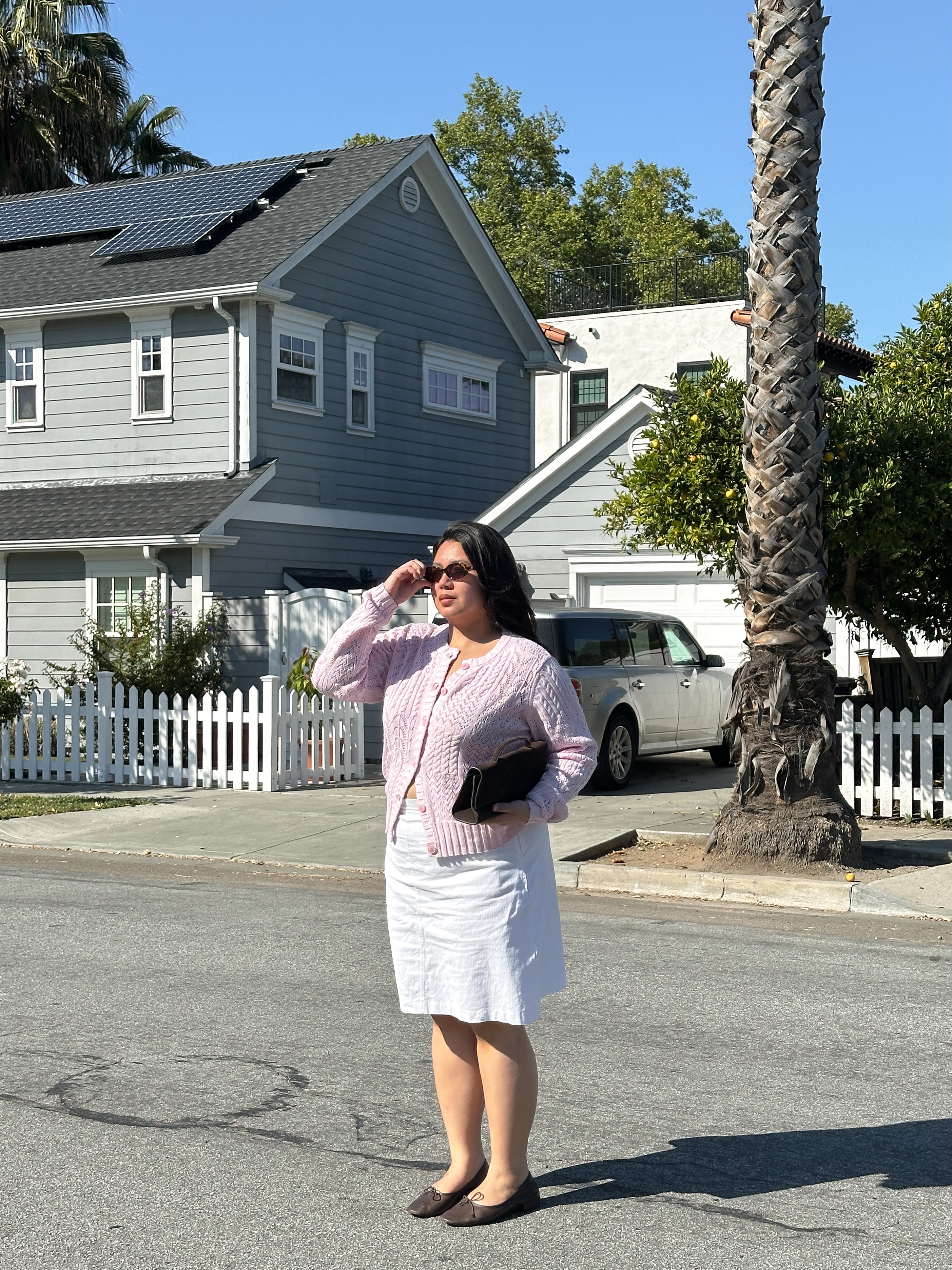 An image of a woman wearing best white linen fashion item for summer 2026
