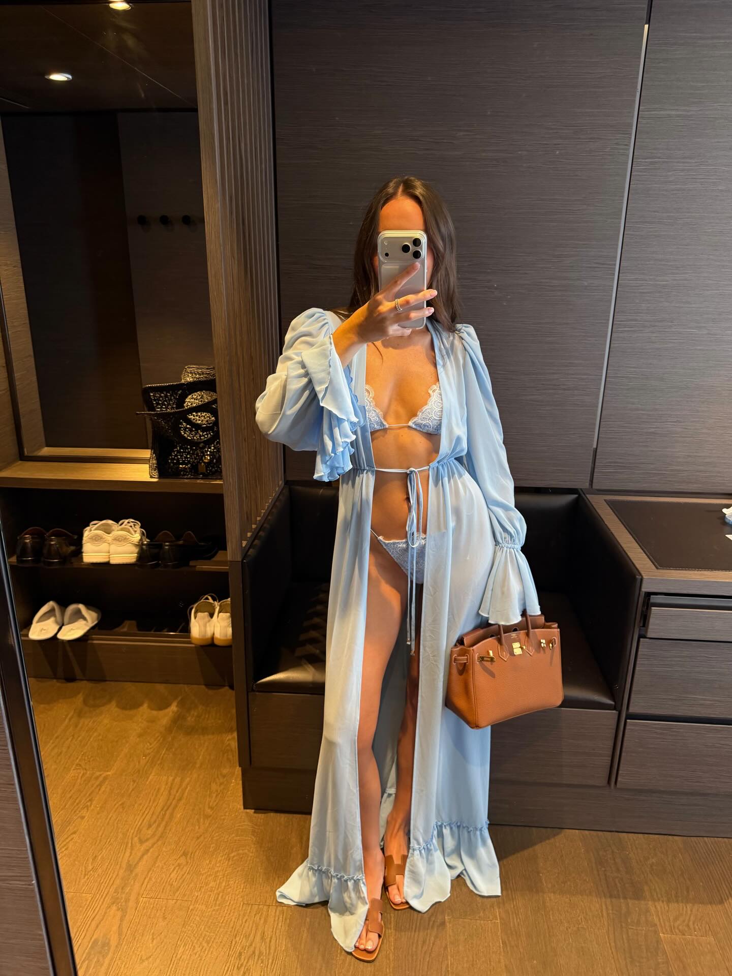 An image of a woman wearing front tie top bikini outfit summer 2026