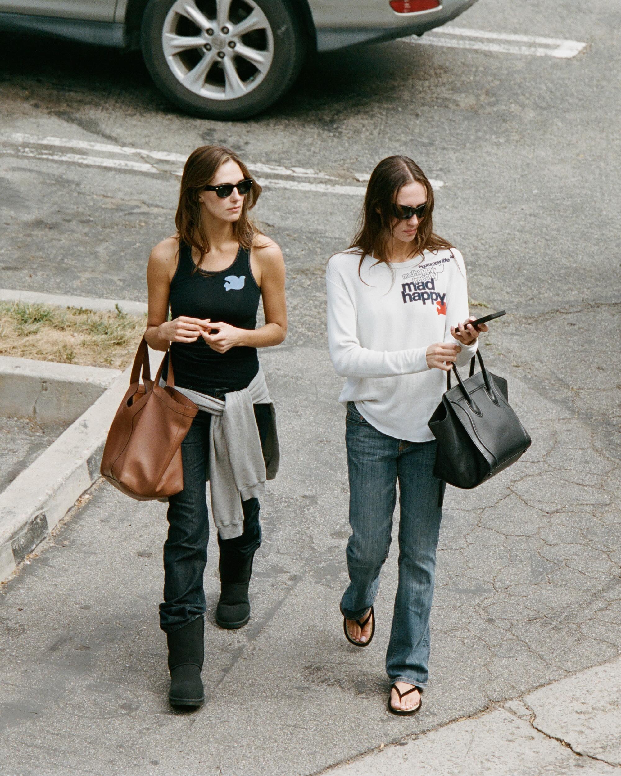 Devon Lee Carlson and Sydney Carlson wearing Madhappy clothing.