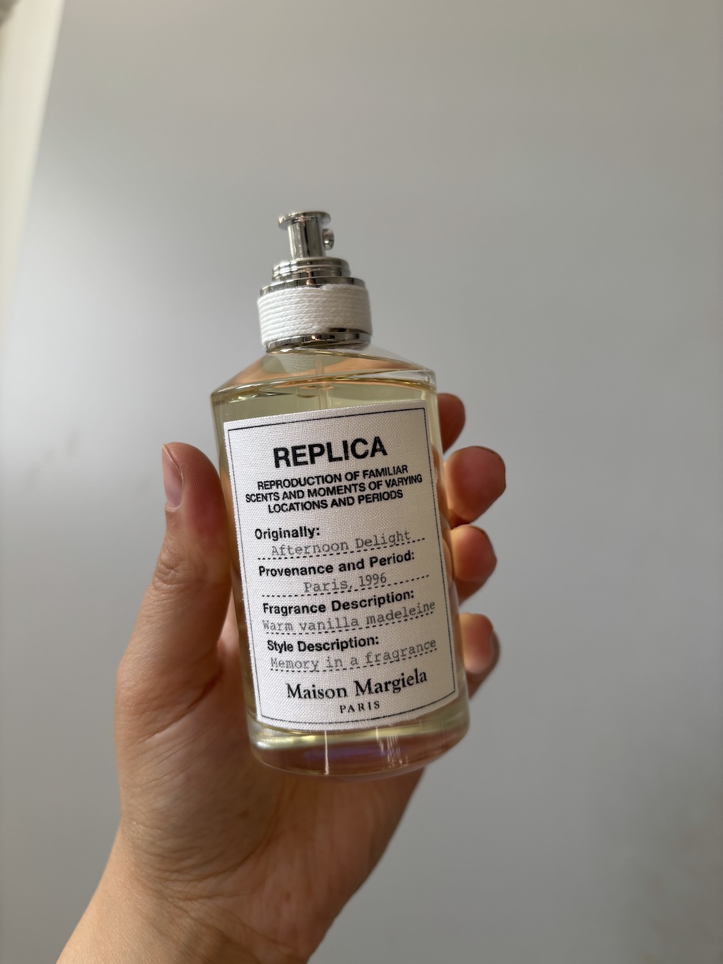 Mica Ricketts holding Maison Margiela Afternoon Delight