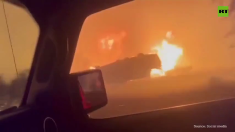 Raging wildfire forces 20,000 to flee in Canada (VIDEO)