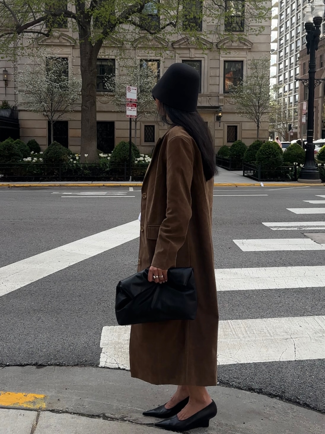 An image of @dawn.tan wearing a knitted bucket hat, one of the biggest hat trends of 2026.