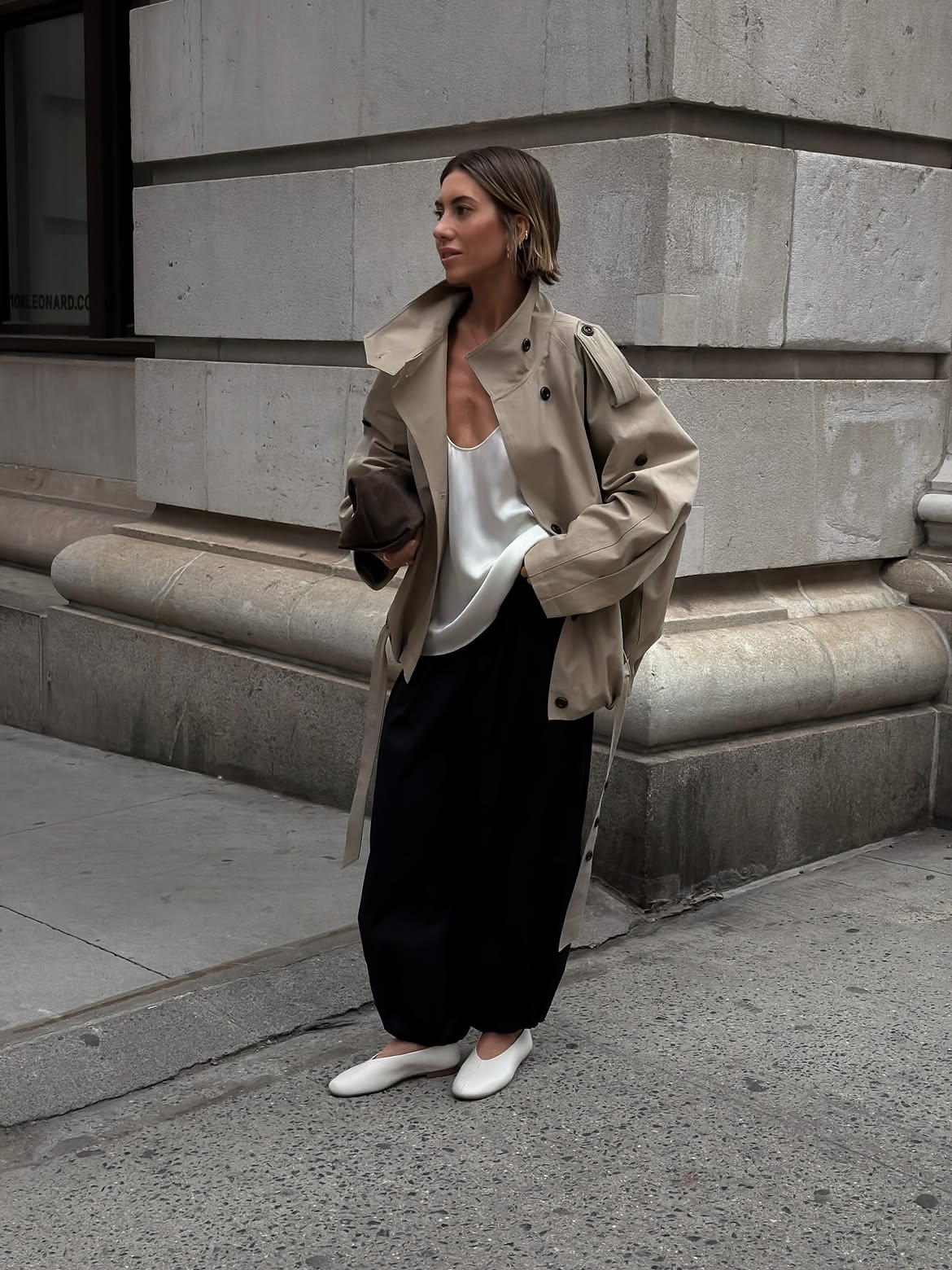 Hannah wearing trench coat