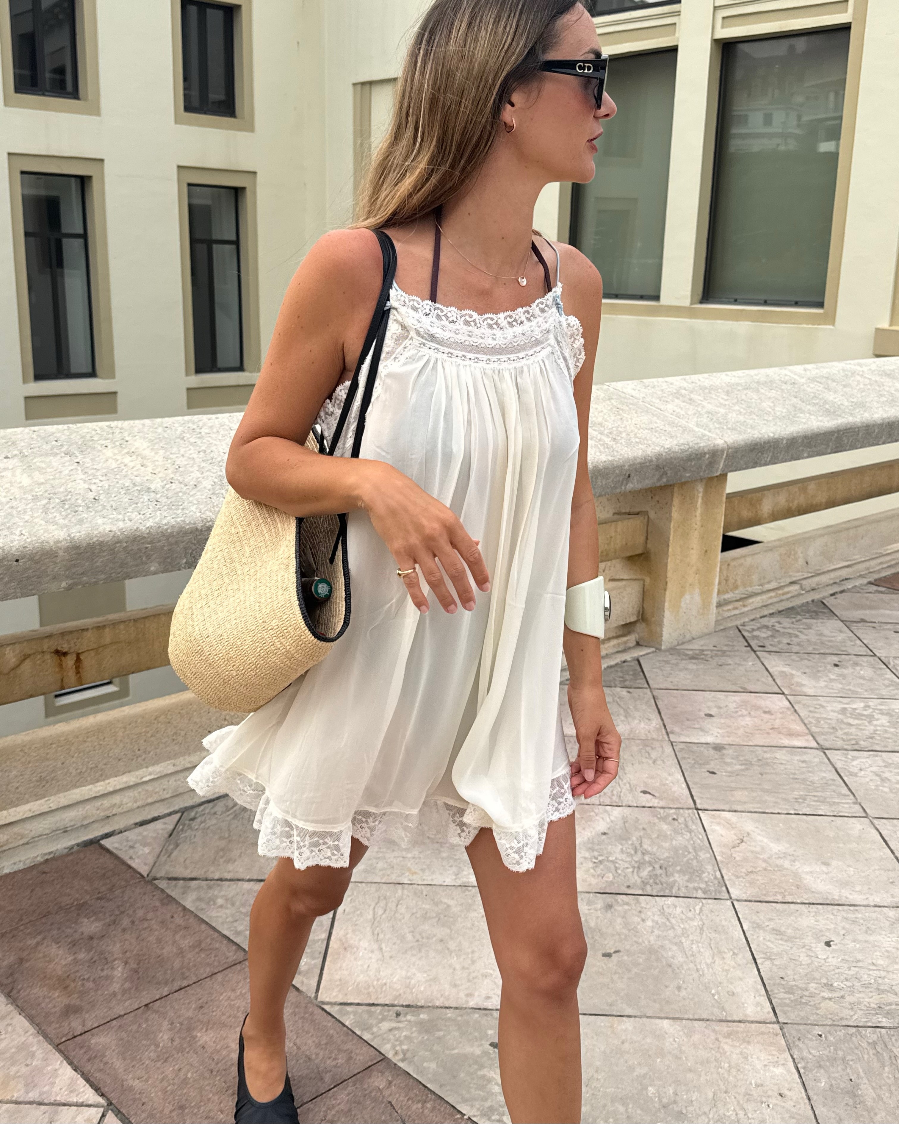 Anne-Laure Mais wearing a baby-doll dress.
