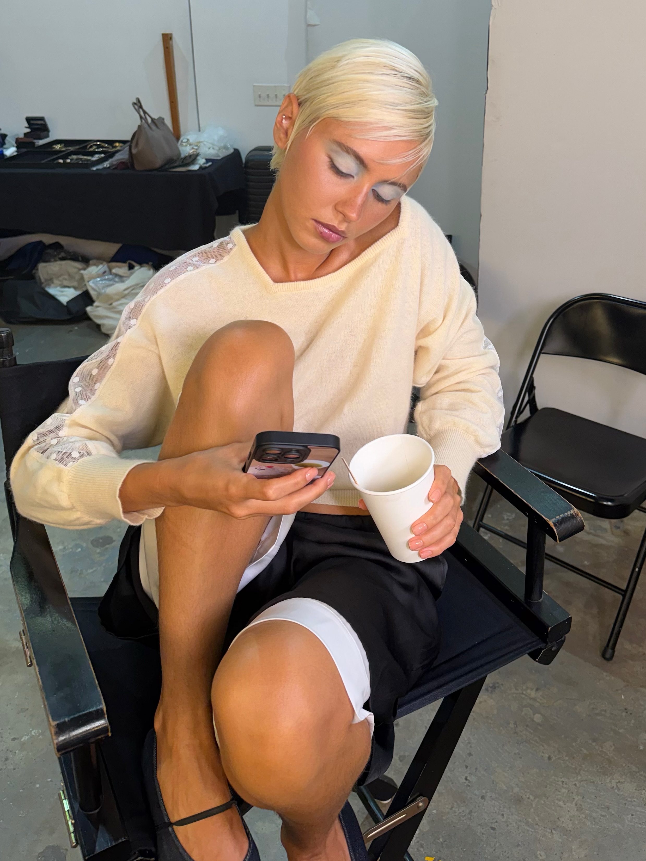 Iris Law with a pixie cut and whisper fringe.
