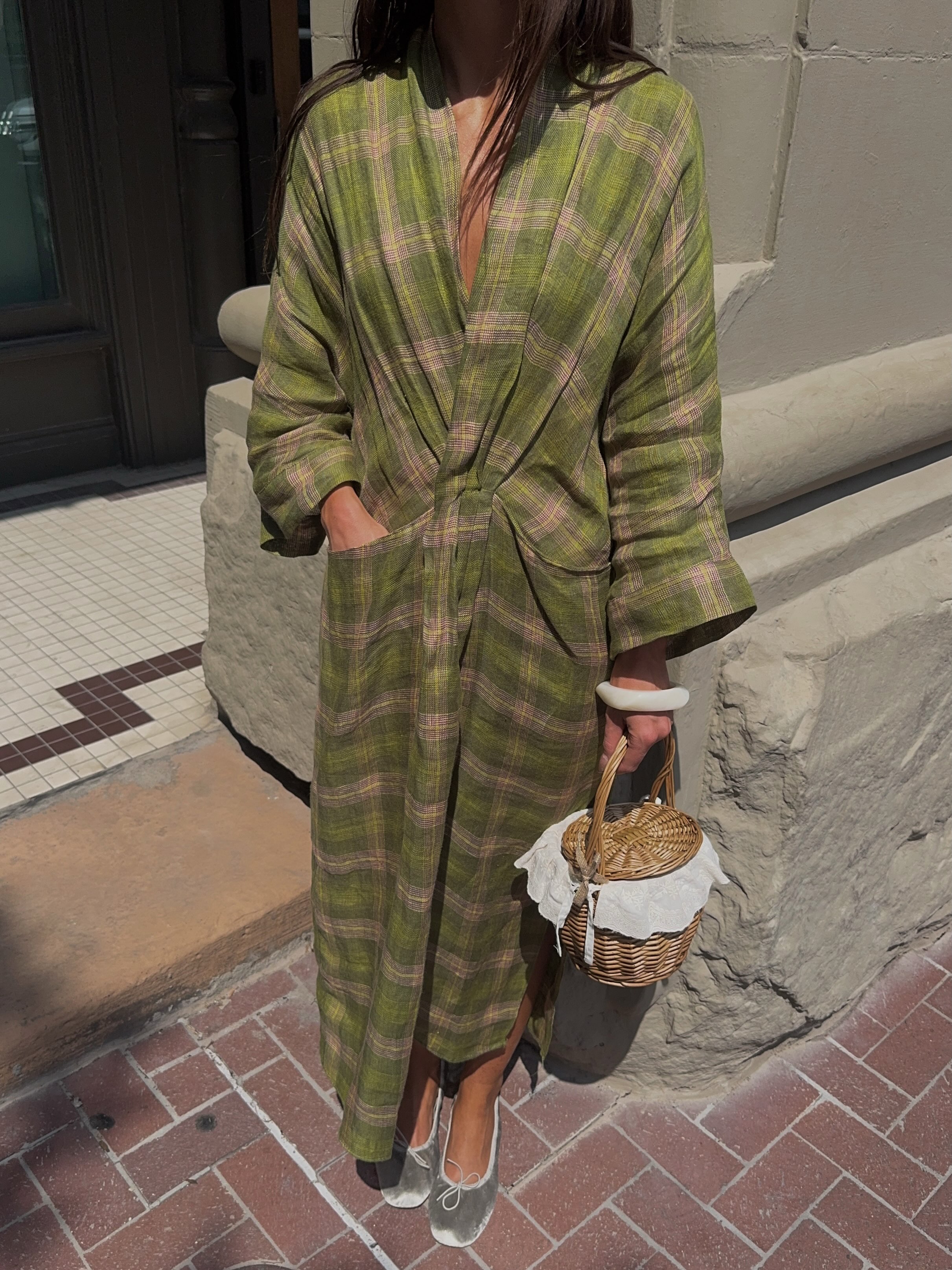 An image of @makenna_alyse  wearing a kaftan with silver ballet flats.