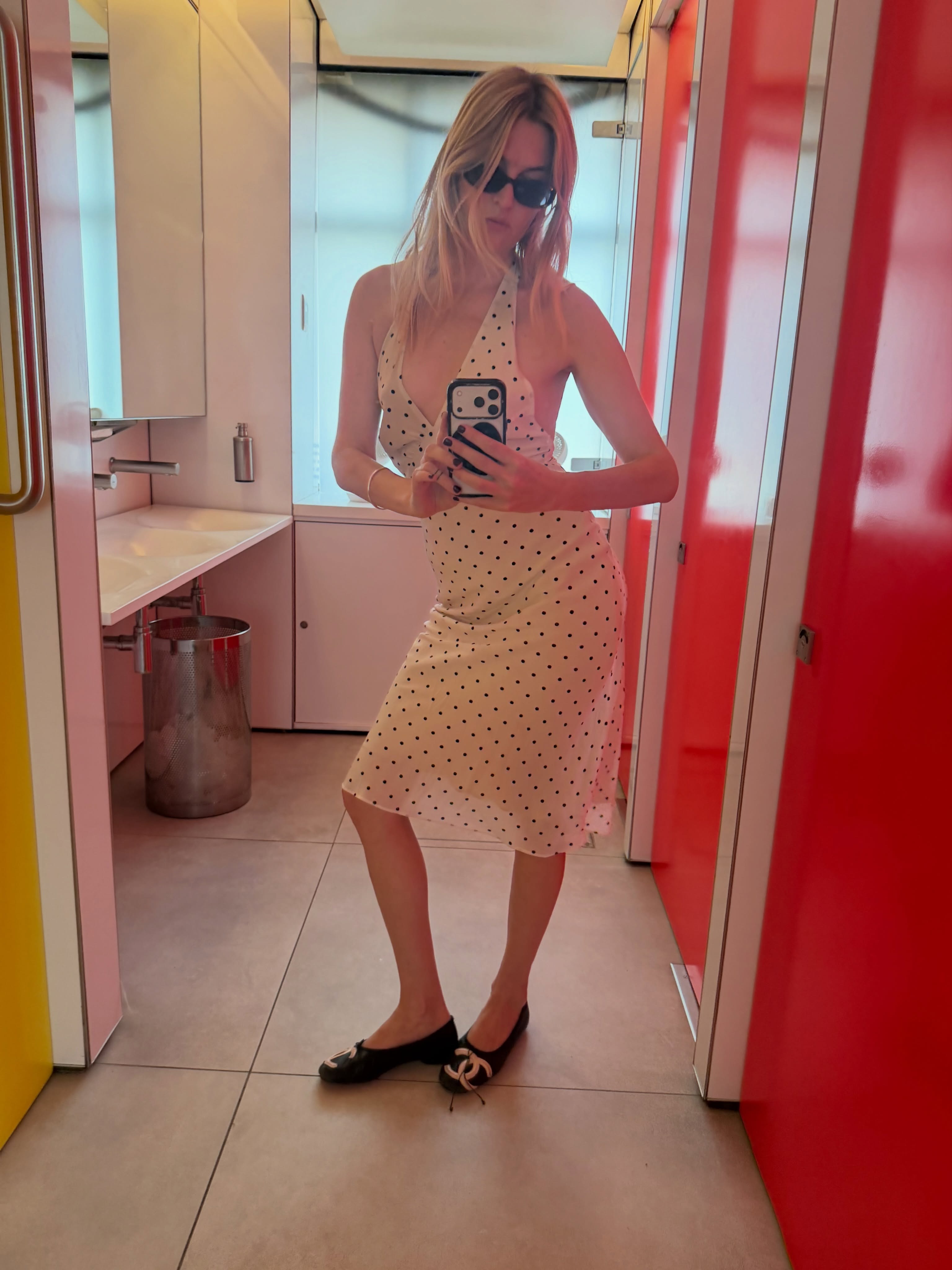 Camille Charriere wearing a polka dot dress.