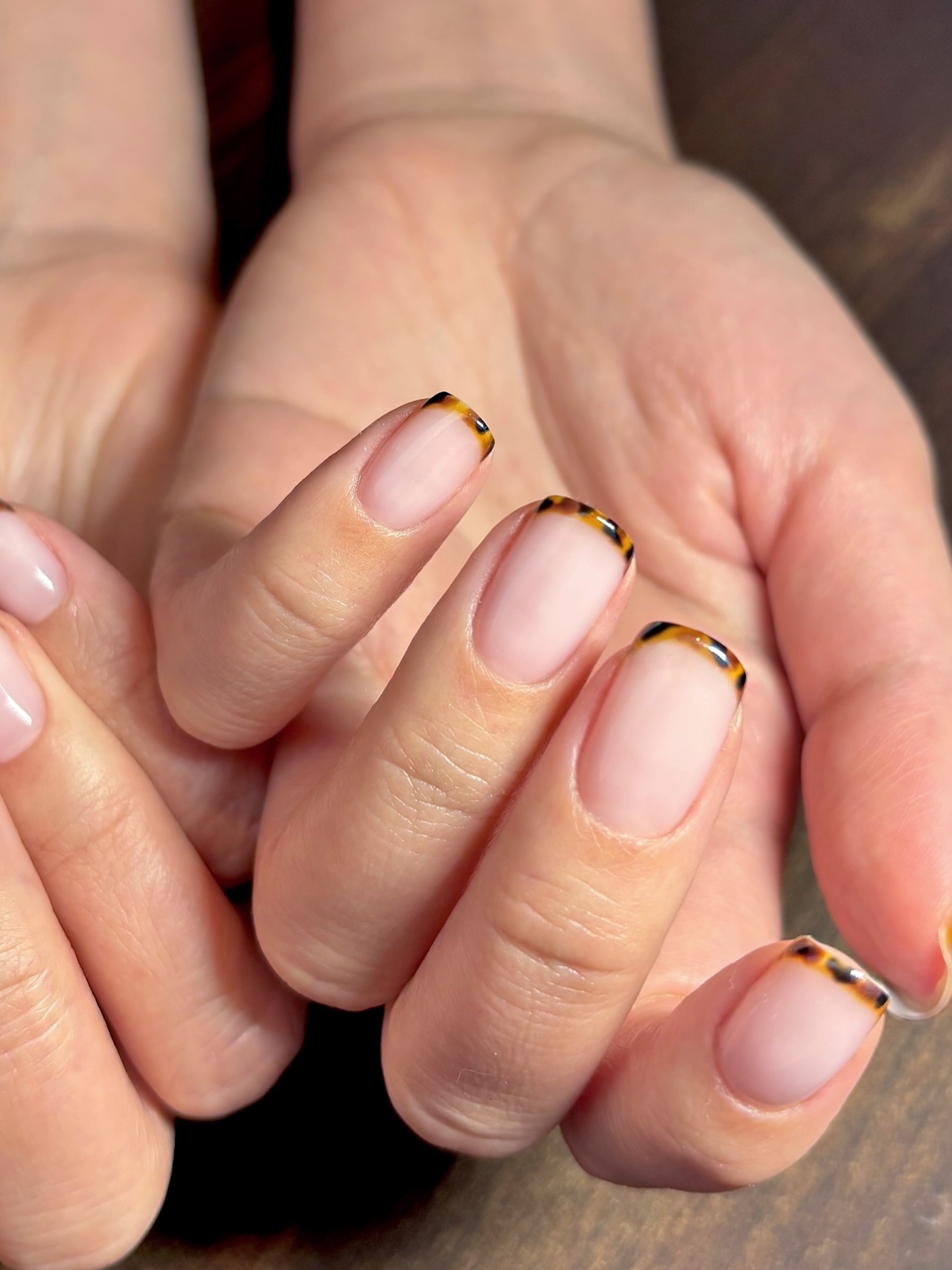 Baby animal print French tips.