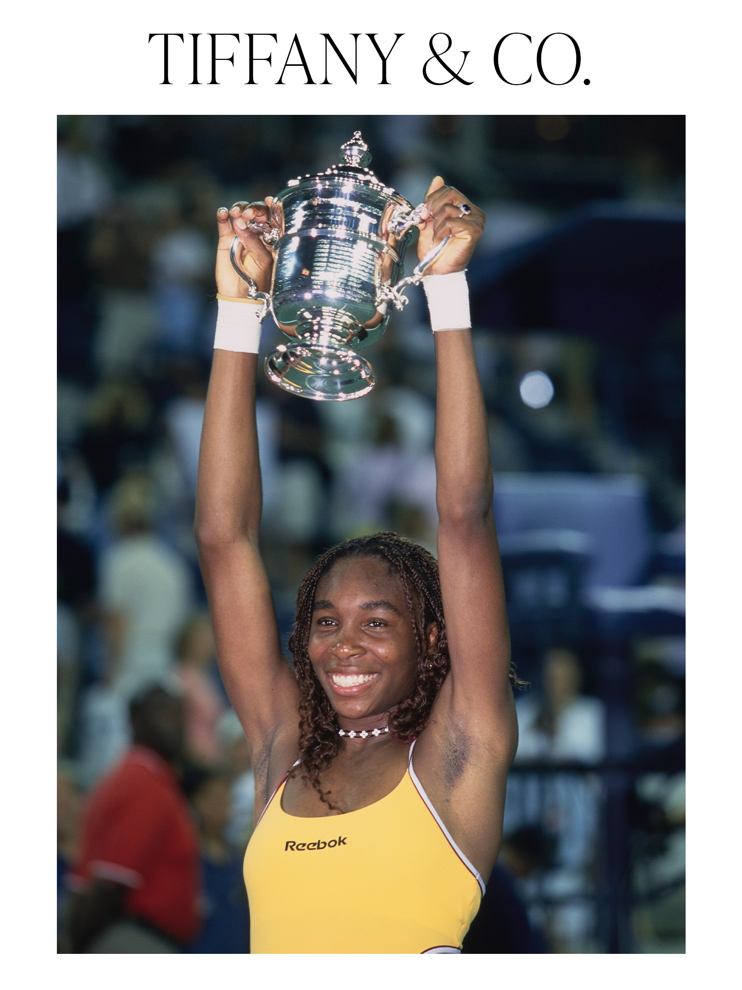 Venus Williams holds the Tiffany & Co. trophy after defeating Lindsay Davenport in the Women's Singles Final match of the US Open on September 9, 2000.