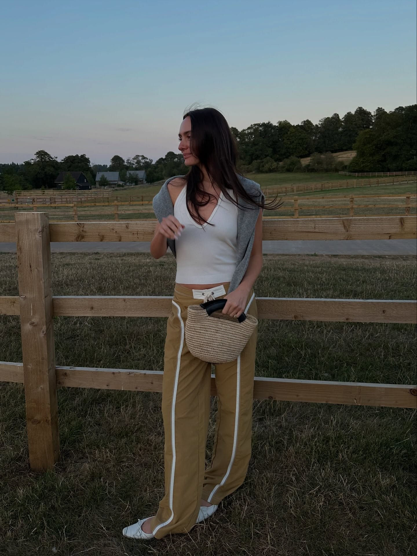 An image of a woman wearing non jeans fall outfit idea 2026