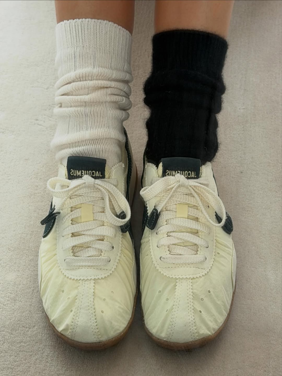 Person wearing ballet sneakers.