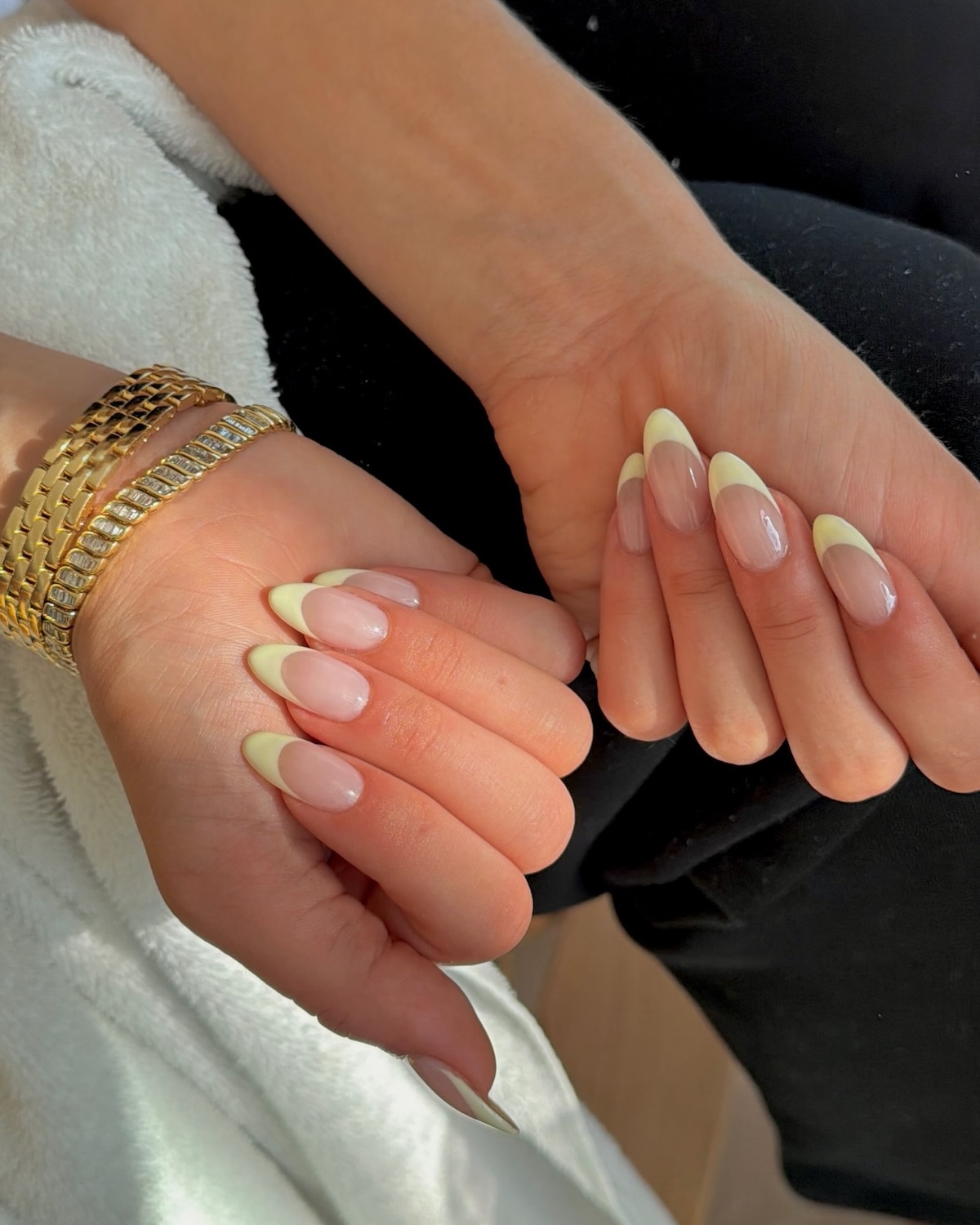 Tate McRae's butter yellow French manicure.