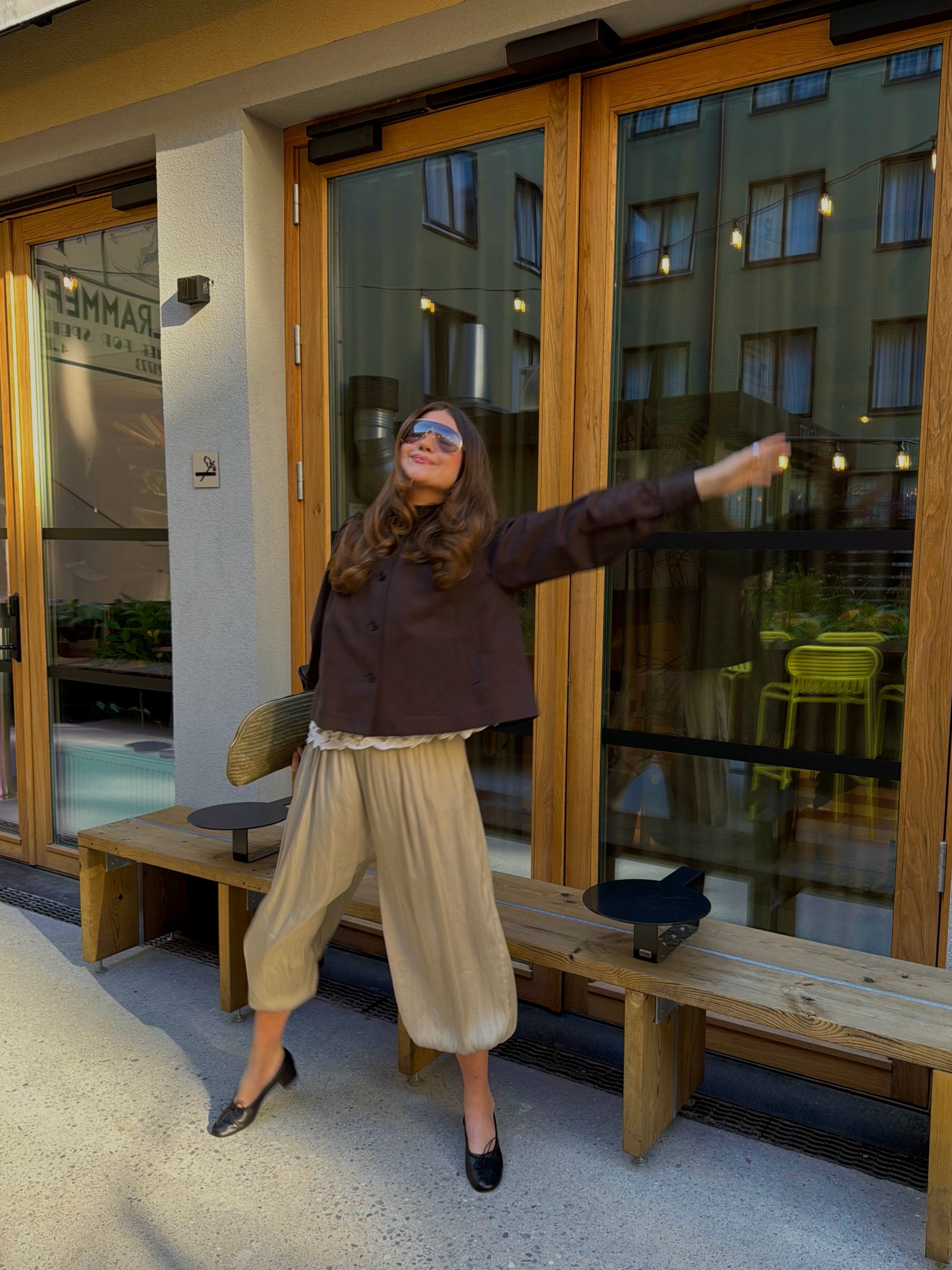 An image of a woman wearing non jeans fall outfit idea 2026