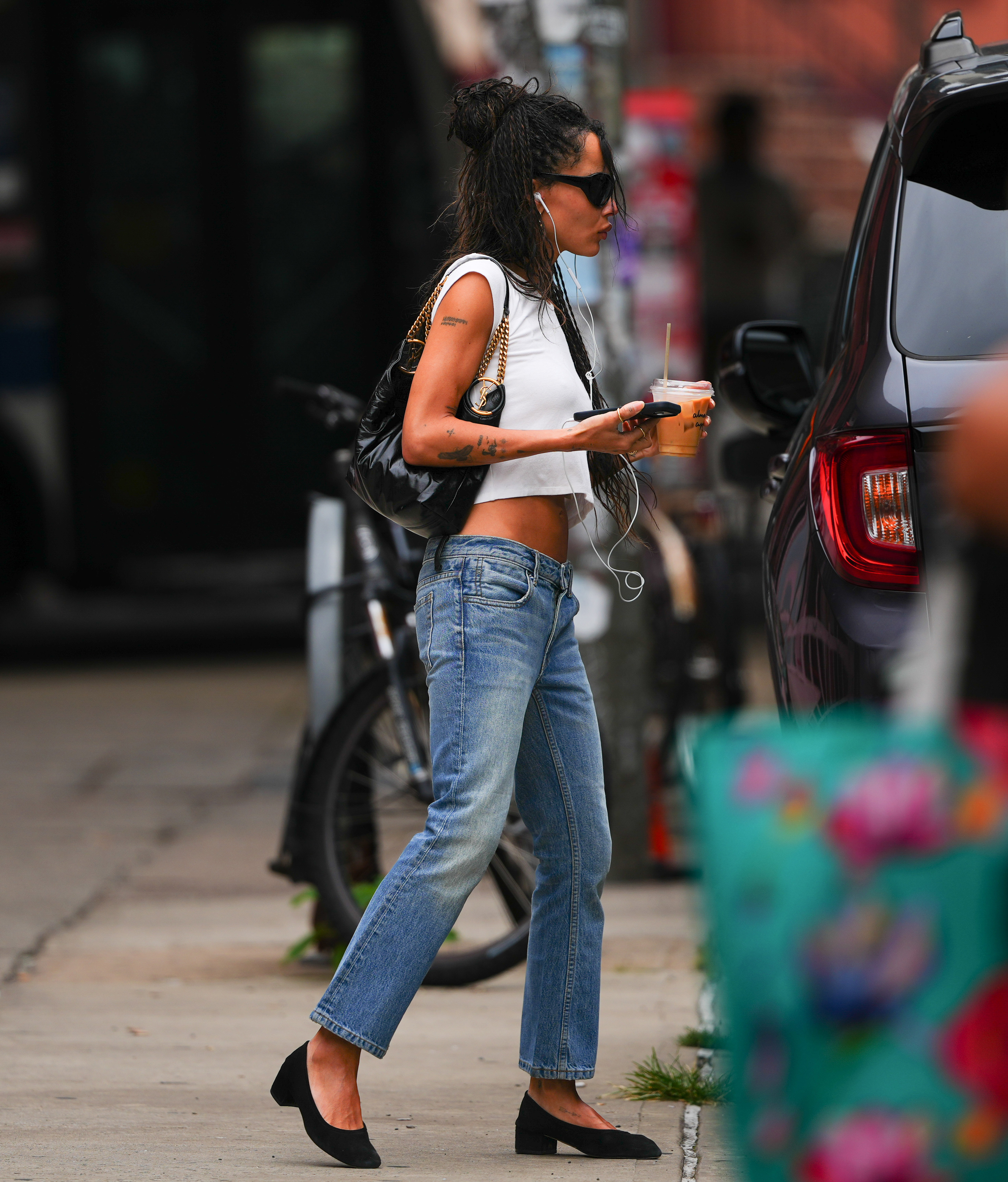 Zo&euml; Kravitz wearing a denim outfit.