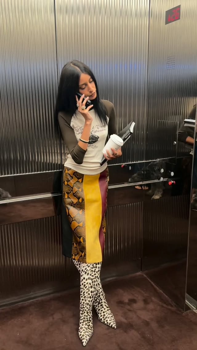 An image of @anaasaber wearing the printmaxxing autumn fashion trend.