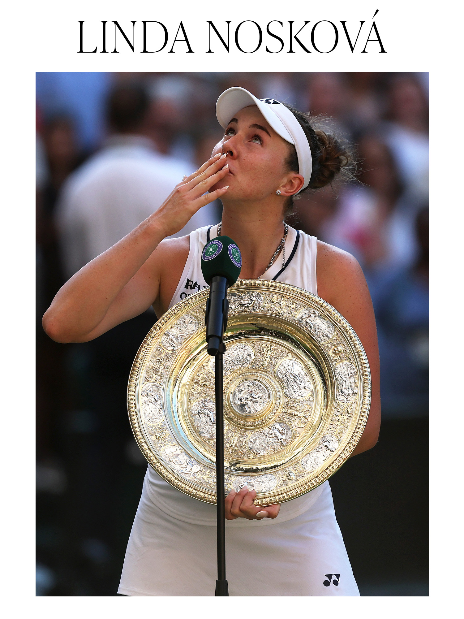 Linda Noskova of Czechia holding the Venus Rosewater Dish after winning against Karolina Muchova of Czechia in their Ladies' Singles final match on day 13 of Wimbledon 2026 on July 11, 2026.