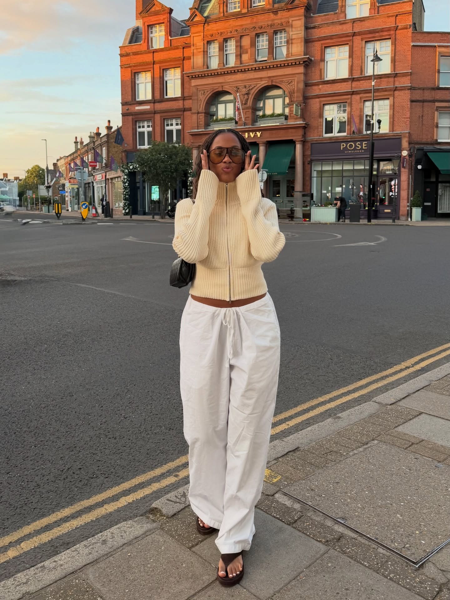 An image of a woman wearing non jeans fall outfit idea 2026