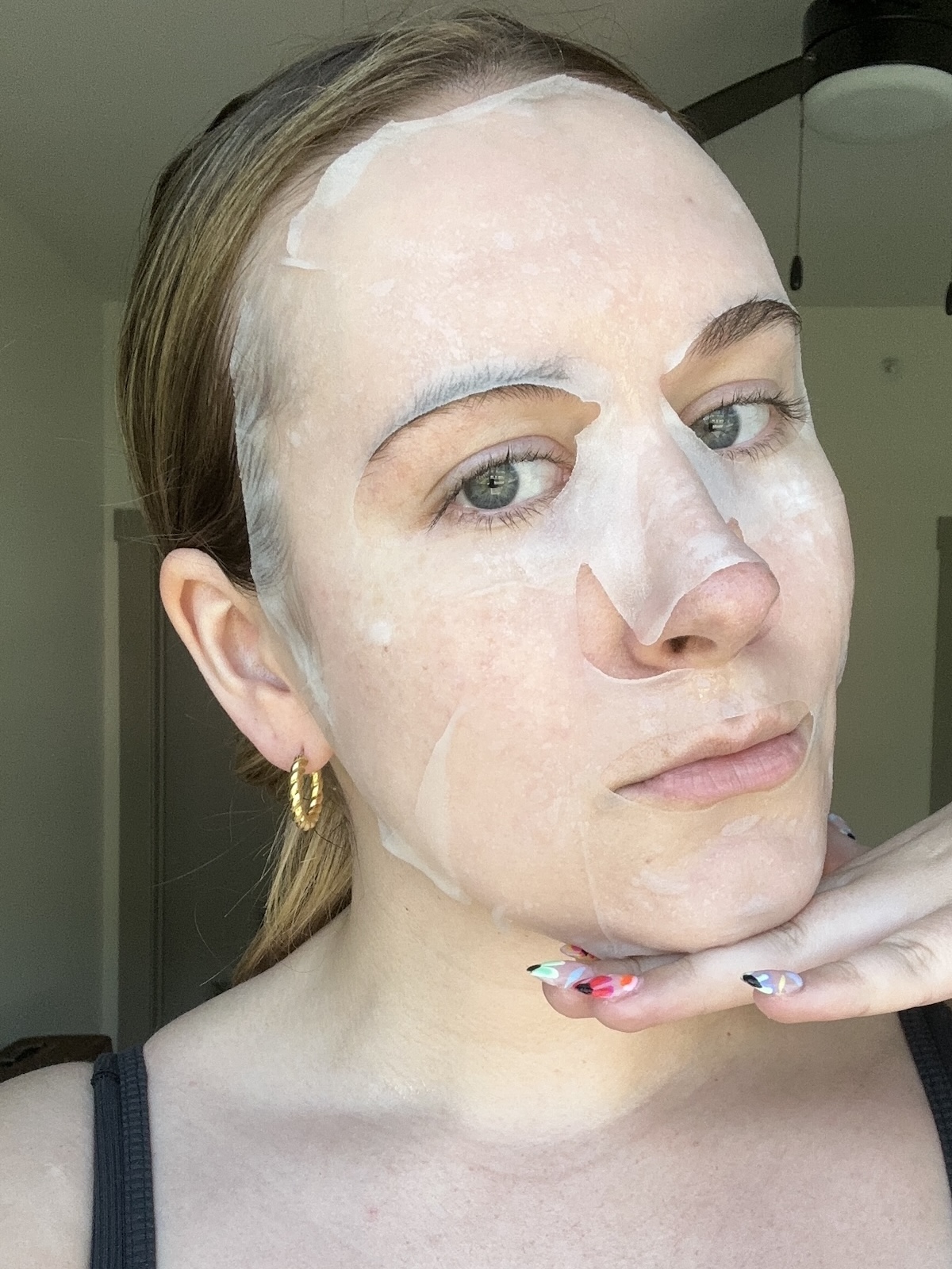 Beauty editor Kaitlyn McLintock wearing ESW Beauty sheet mask